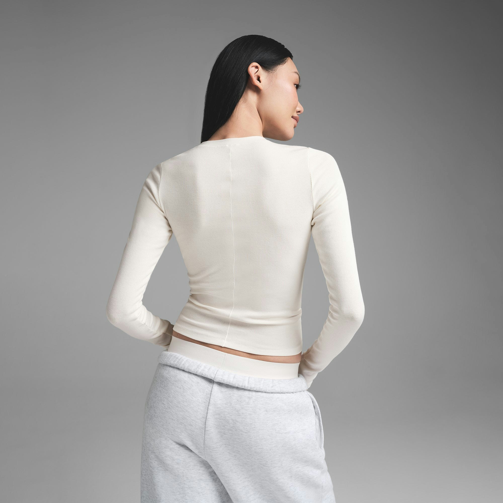 COTTON RIB LONG SLEEVE T-SHIRT | MARBLE ON A MODEL BACK VIEW  | FOCUS: 0.9, 0.1, 0.7