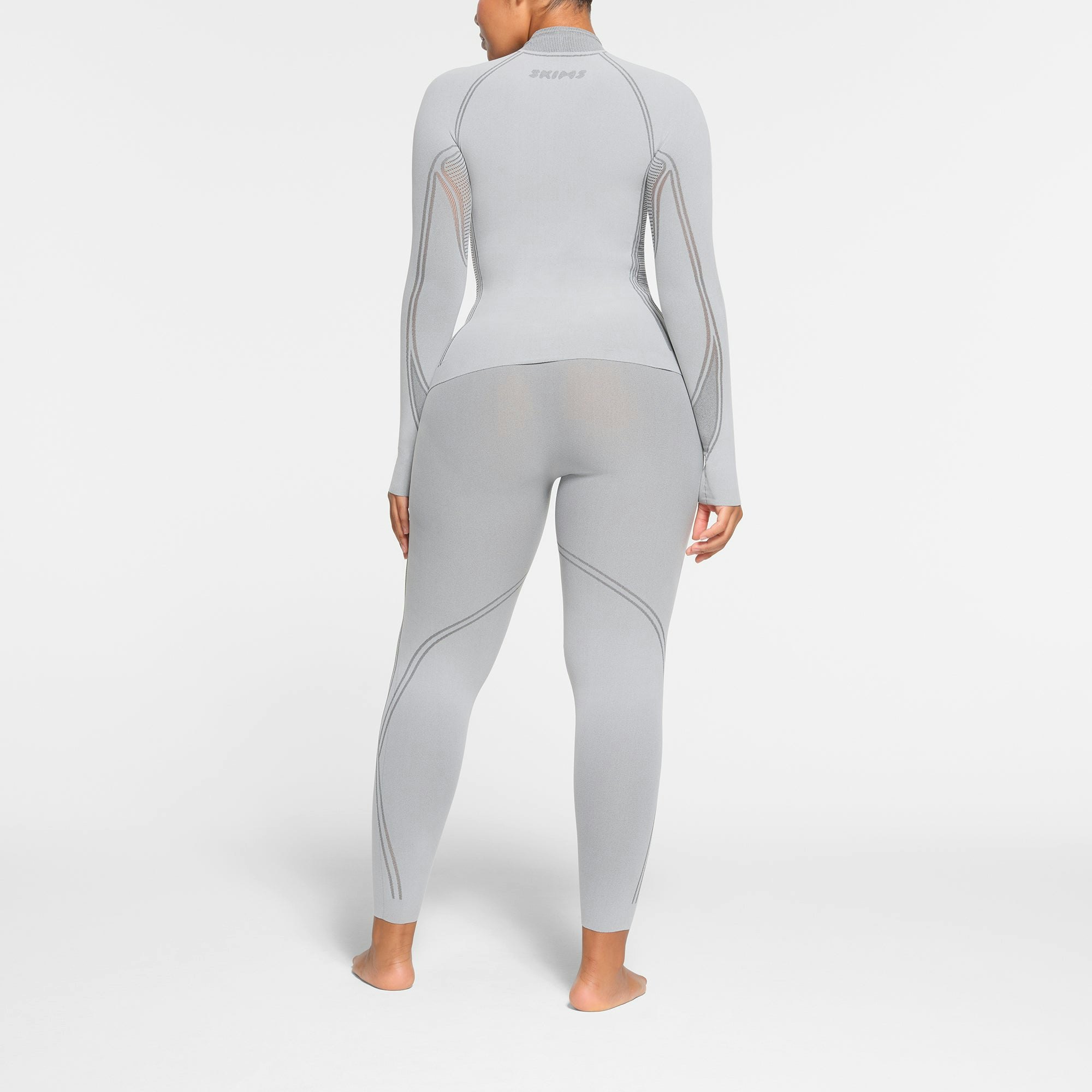 SKIMS FIRST LAYERS TURTLENECK TOP | MIRROR ON A MODEL BACK VIEW