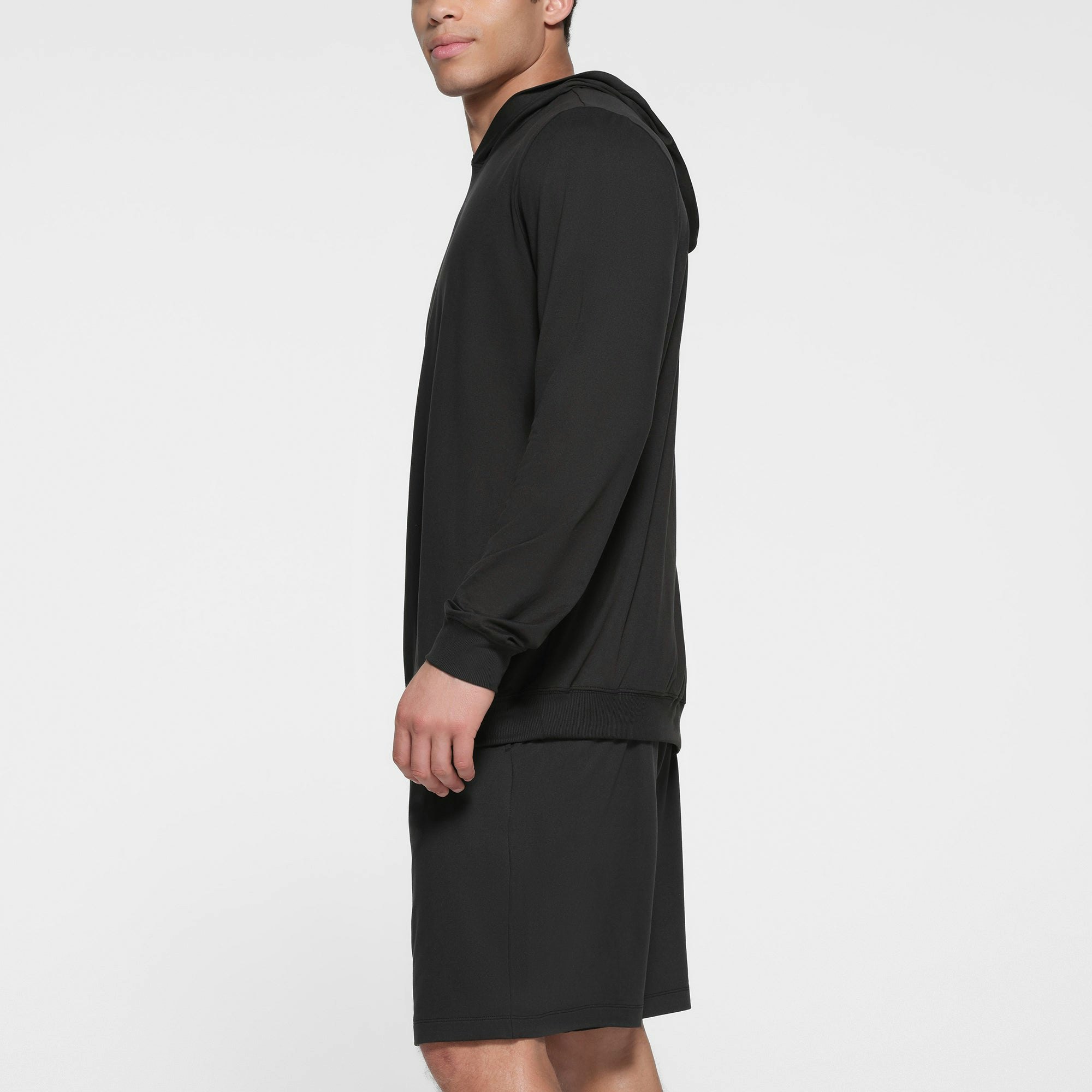 OUTDOOR JERSEY MENS CLASSIC HOODIE | ONYX ON A MODEL SIDE VIEW