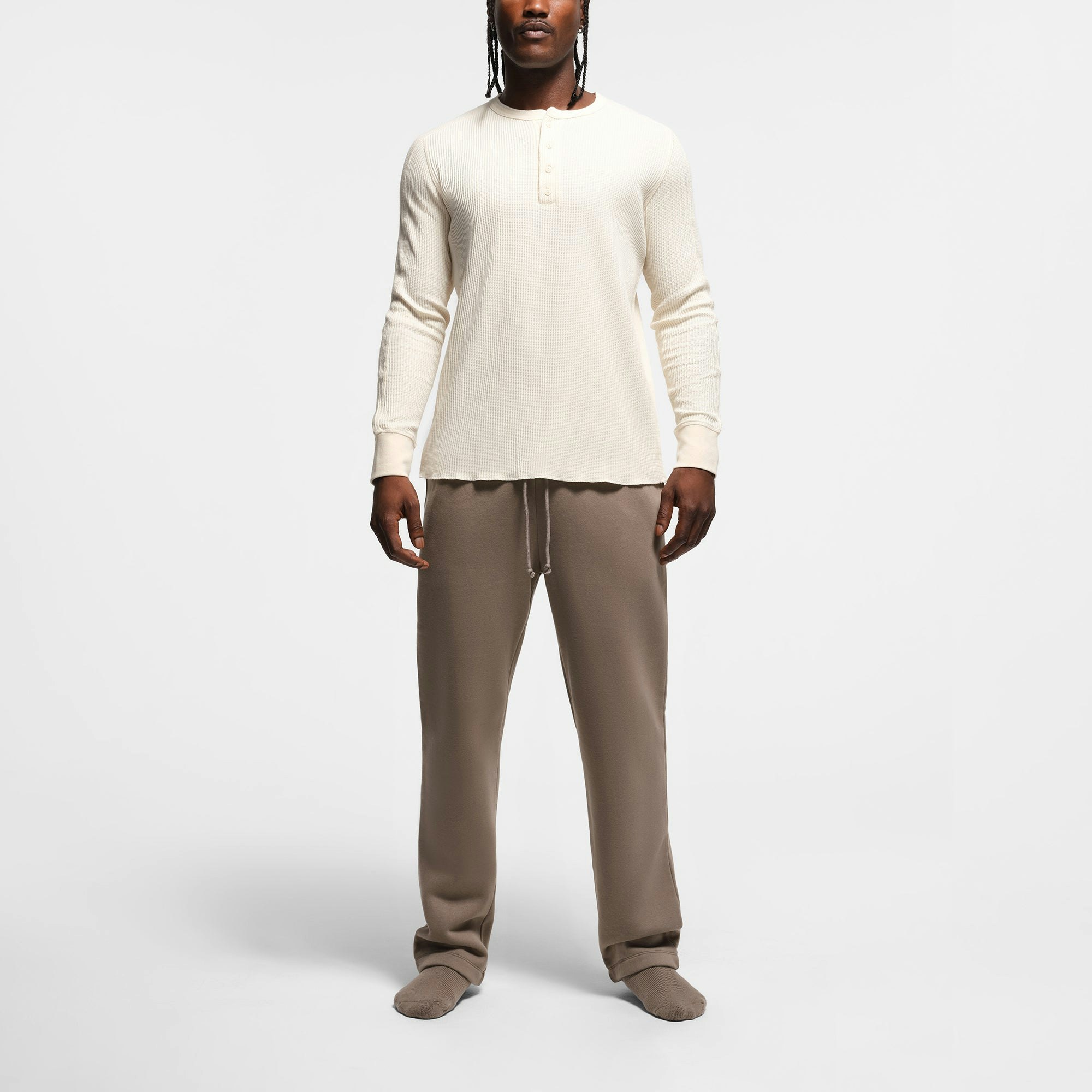WAFFLE MENS SLIM LONG SLEEVE HENLEY | ECRU ON A MODEL FRONT VIEW @ | FOCUS: 0.9, 0.1, 0.7
