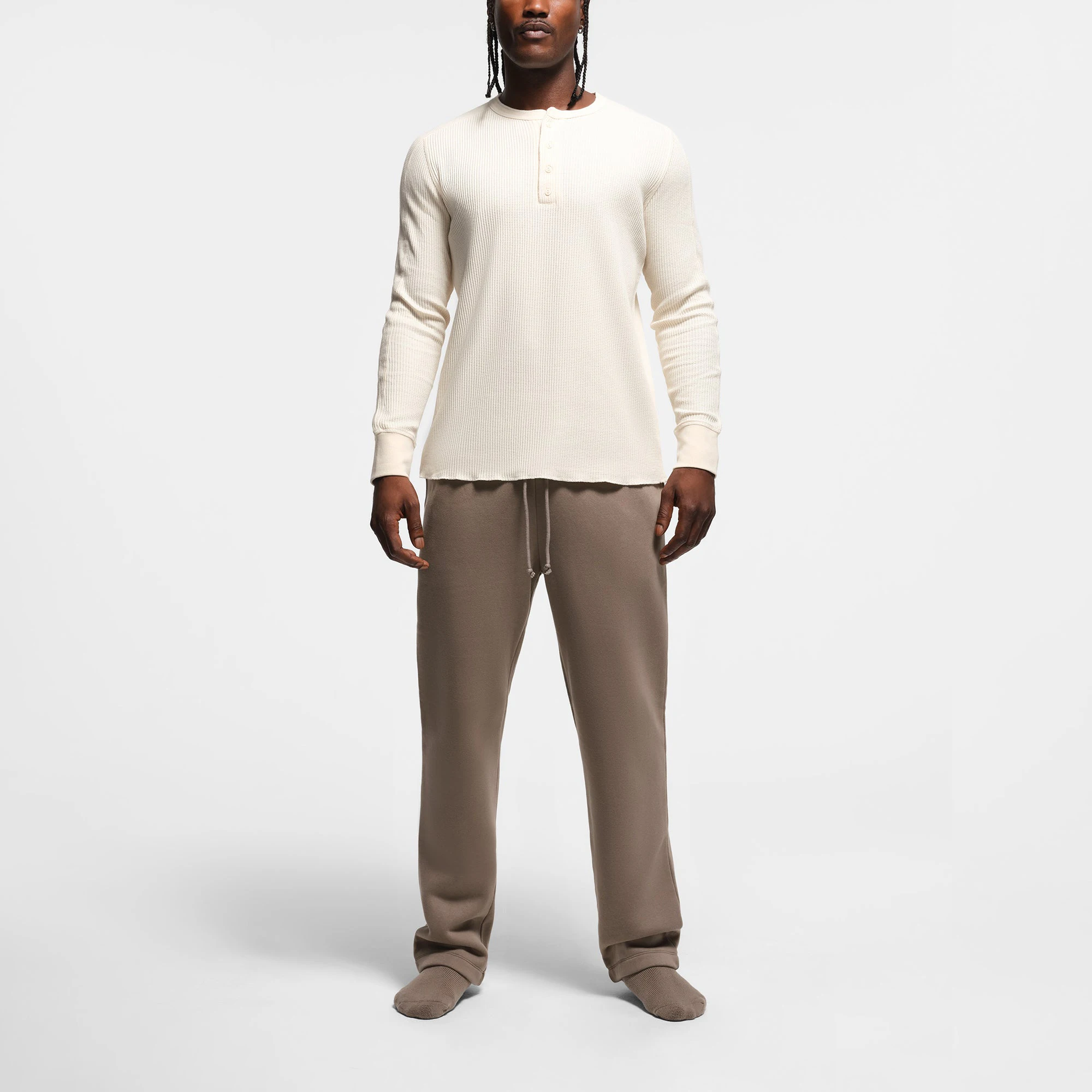 WAFFLE MENS SLIM LONG SLEEVE HENLEY | ECRU ON A MODEL FRONT VIEW @ | FOCUS: 0.9, 0.1, 0.7