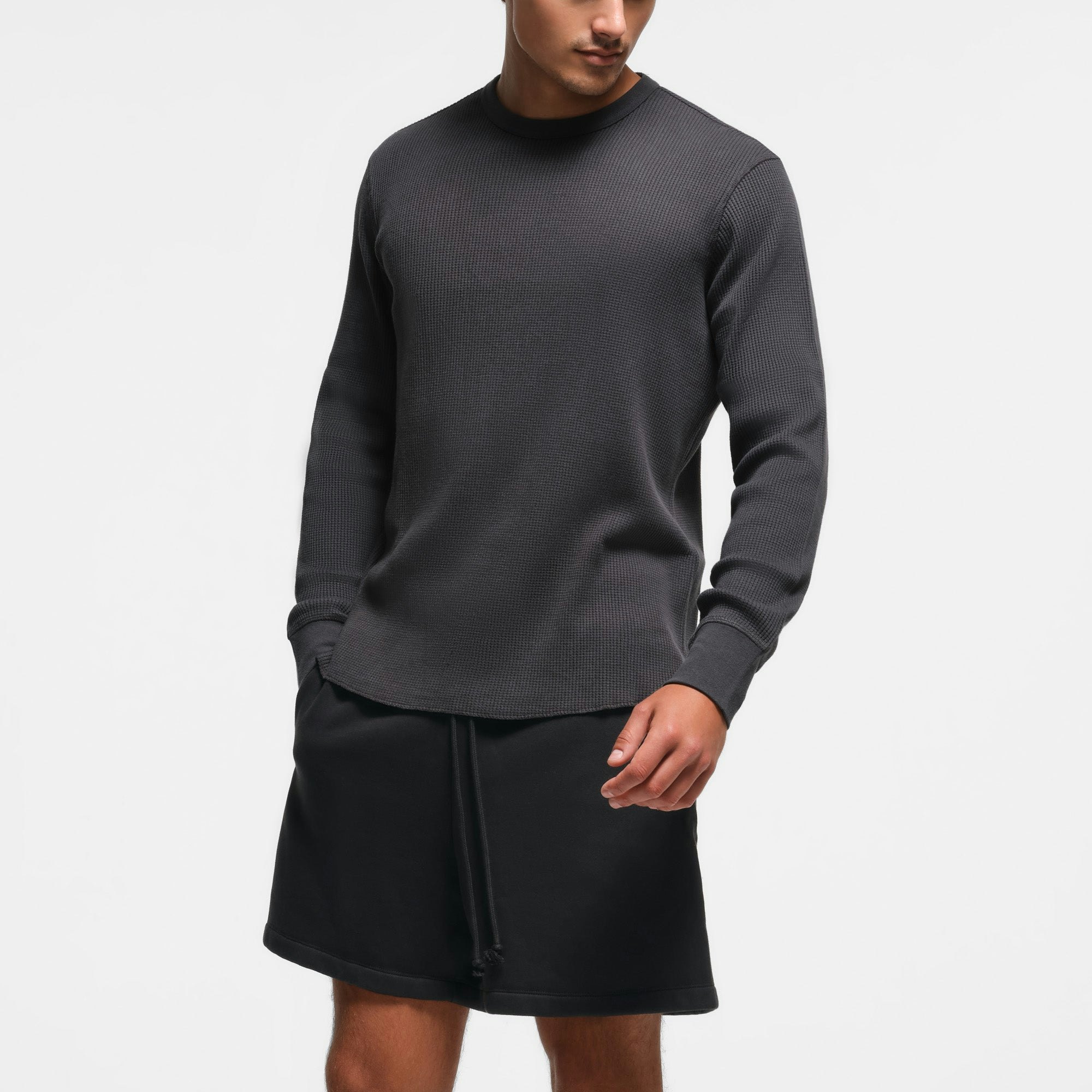 WAFFLE MENS LONG SLEEVE T-SHIRT | ASH ON A MODEL SIDE VIEW