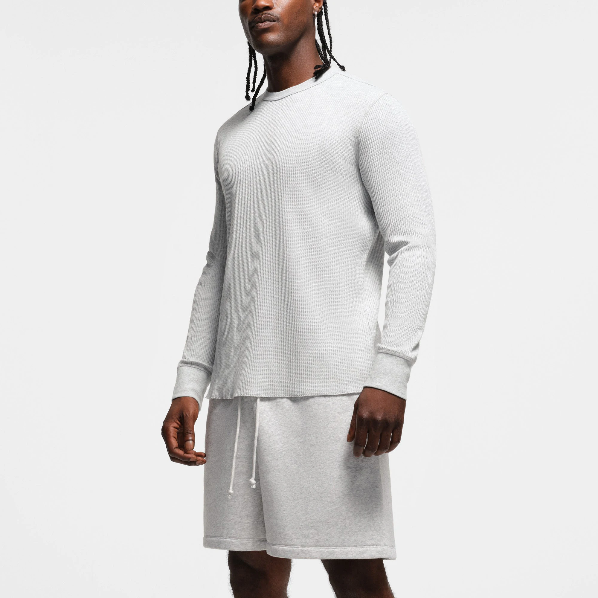 WAFFLE MENS LONG SLEEVE T-SHIRT | LIGHT HEATHER GREY ON A MODEL SIDE VIEW