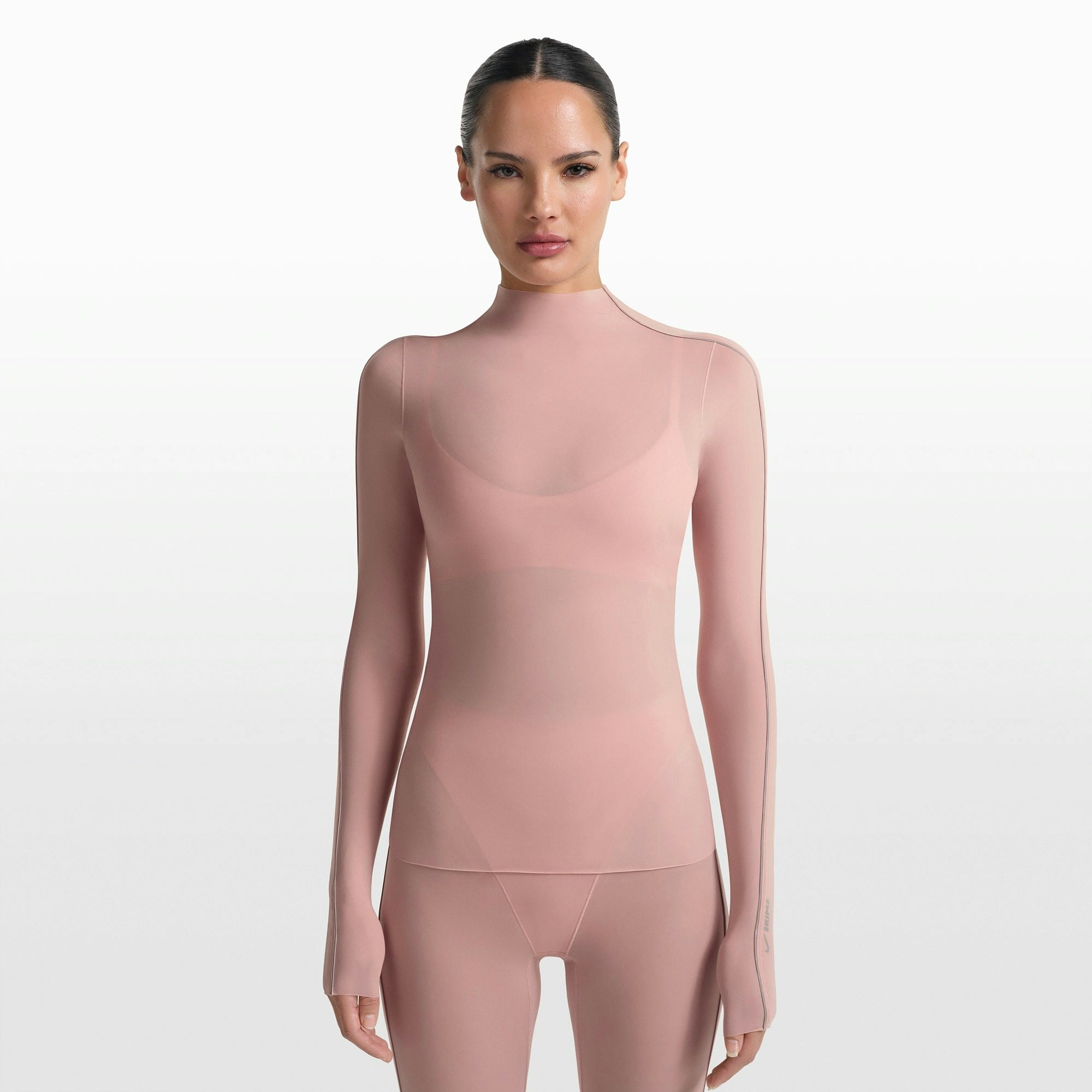NikeSKIMS WEIGHTLESS LAYERS MOCK NECK LONG SLEEVE TOP | HIMALAYAN ON A MODEL FRONT VIEW @ | FOCUS: 0.0, 1.0, 0.9