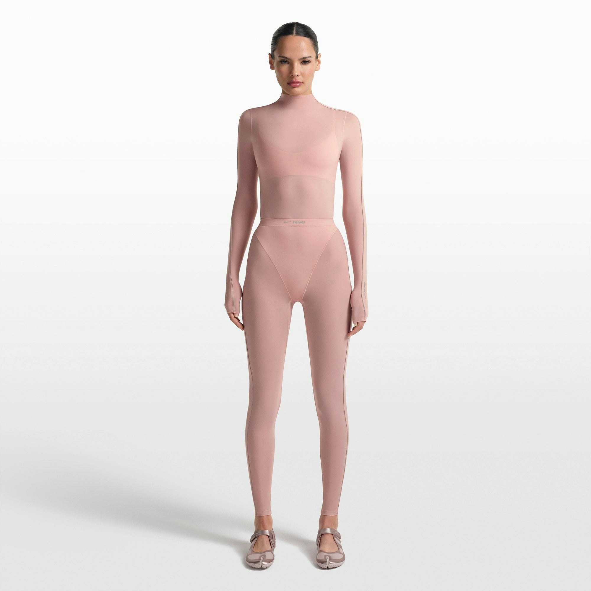 NikeSKIMS WEIGHTLESS LAYERS MOCK NECK LONG SLEEVE TOP | HIMALAYAN ON A MODEL FRONT VIEW @ | FOCUS: 0.0, 1.0, 0.9