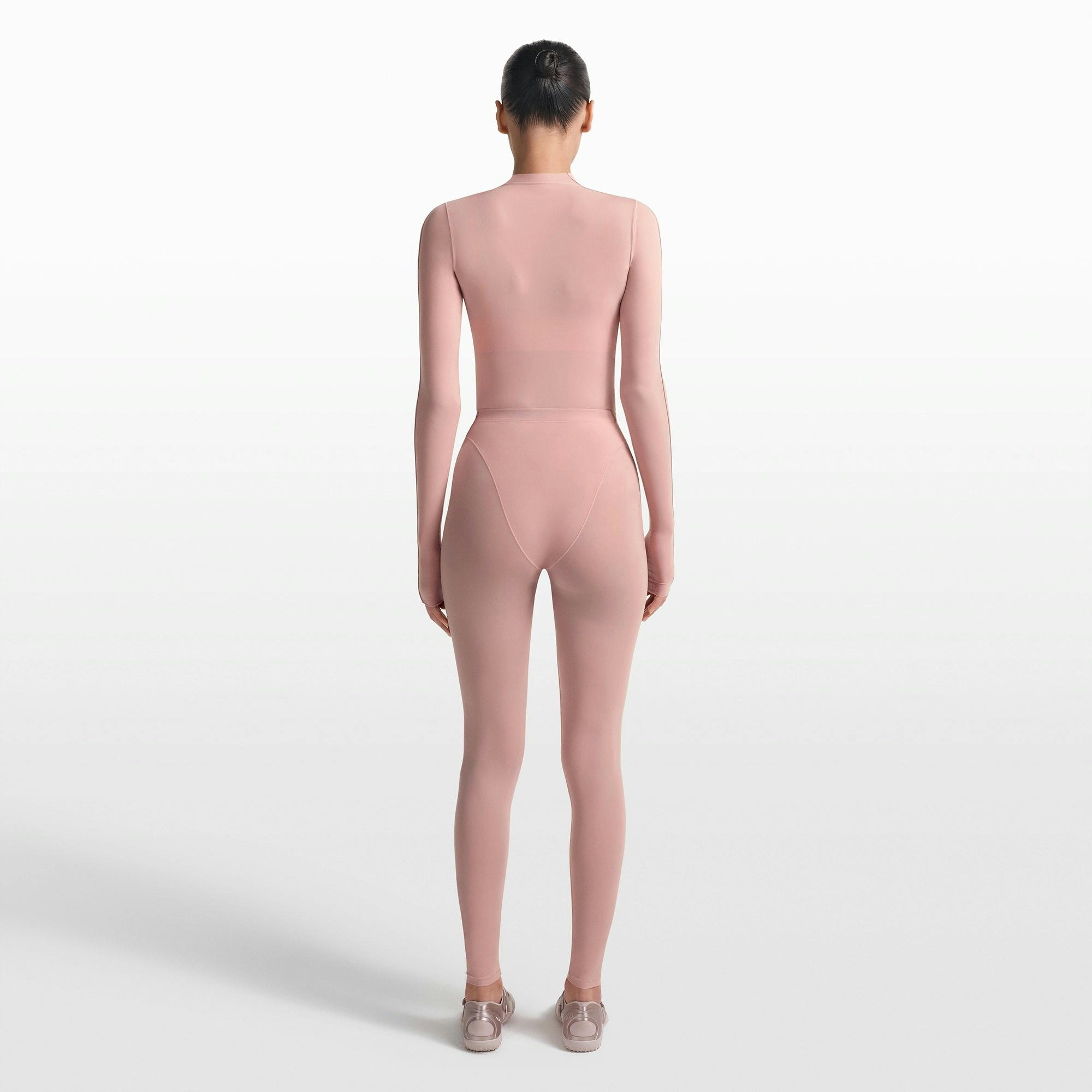 NikeSKIMS WEIGHTLESS LAYERS MOCK NECK LONG SLEEVE TOP | HIMALAYAN ON A MODEL FRONT VIEW @ | FOCUS: 0.0, 1.0, 0.9