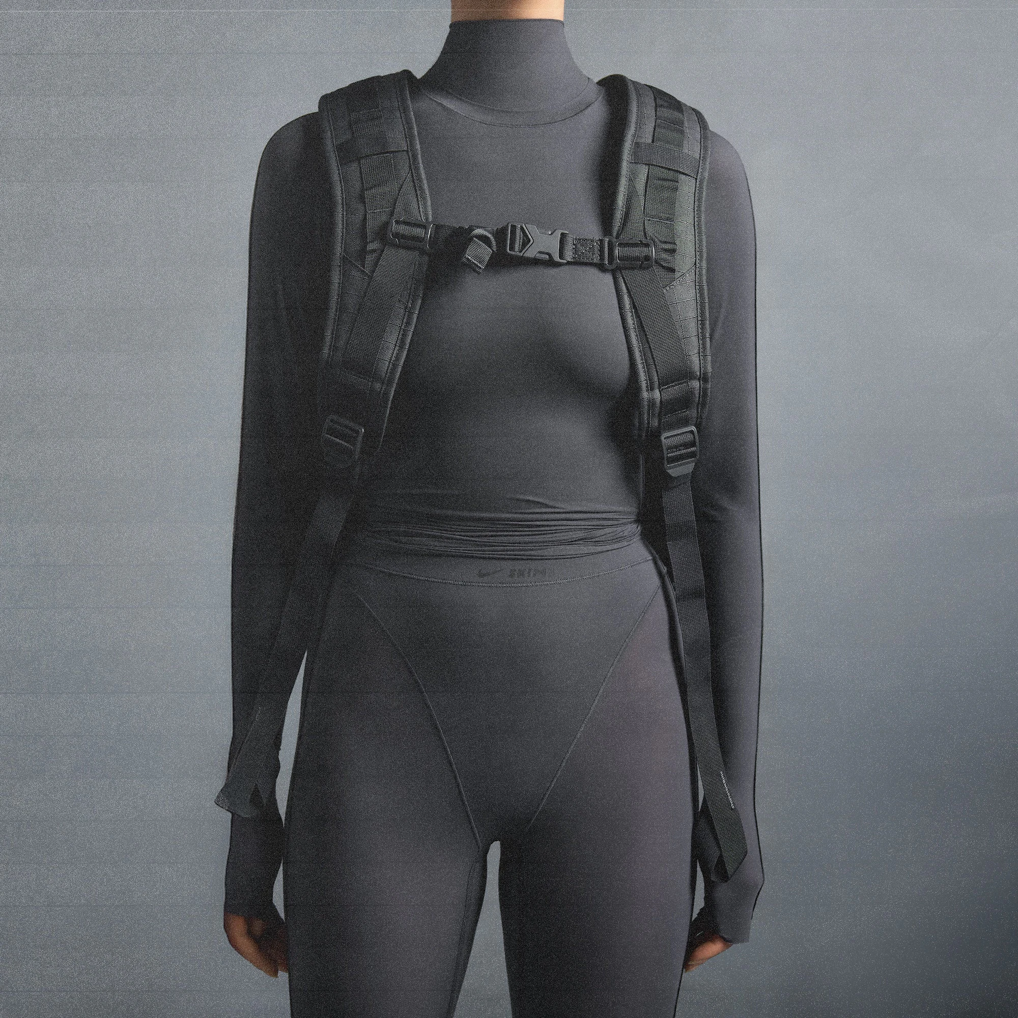 NikeSKIMS WEIGHTLESS LAYERS MOCK NECK LONG SLEEVE TOP | LEAD ON A MODEL SIDE VIEW @ | FOCUS: 0.0, 1.0, 0.9