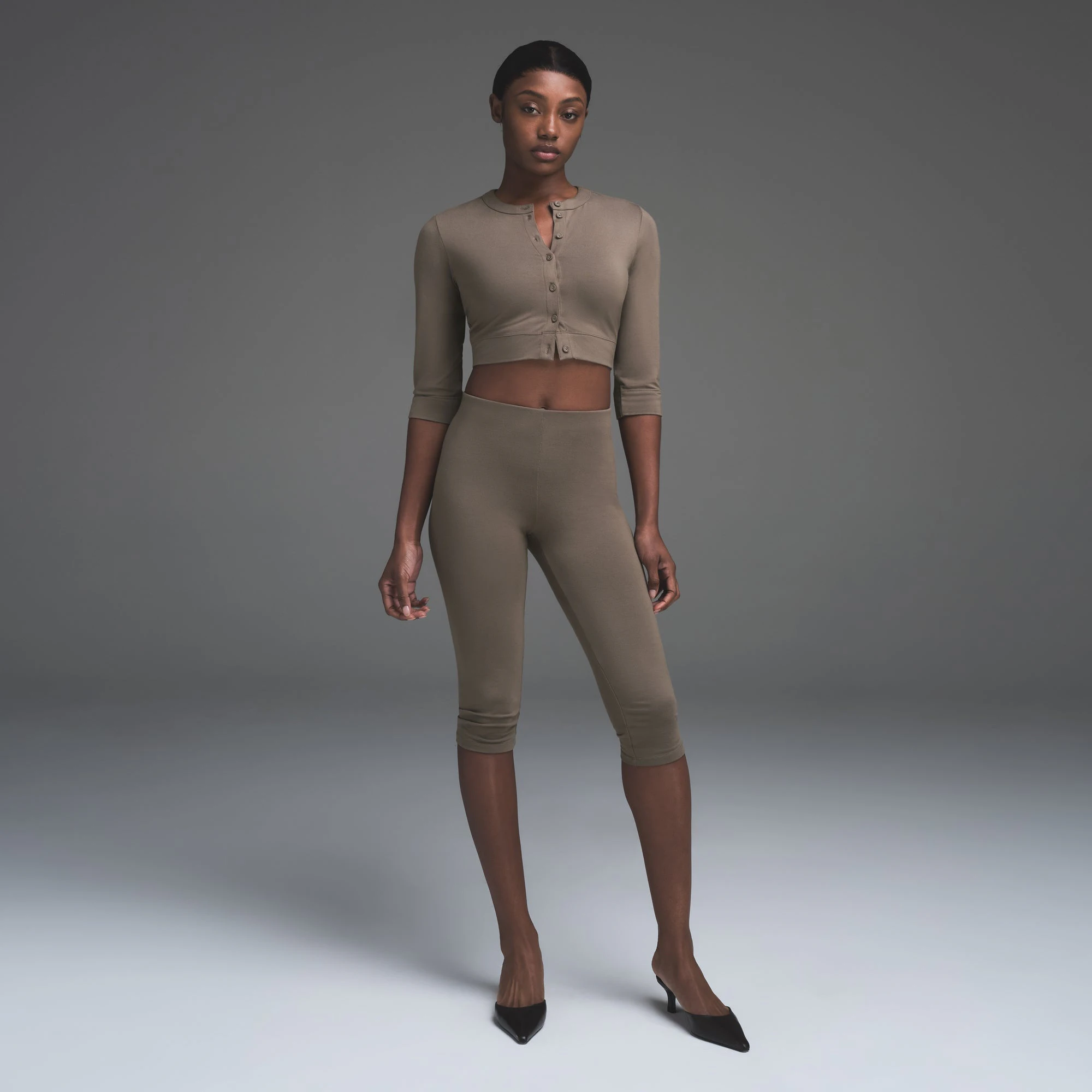 SMOOTH LOUNGE CROPPED CARDIGAN | TRUFFLE  ON A MODEL BACK VIEW | FOCUS: 0.0, 1.0, 0.9