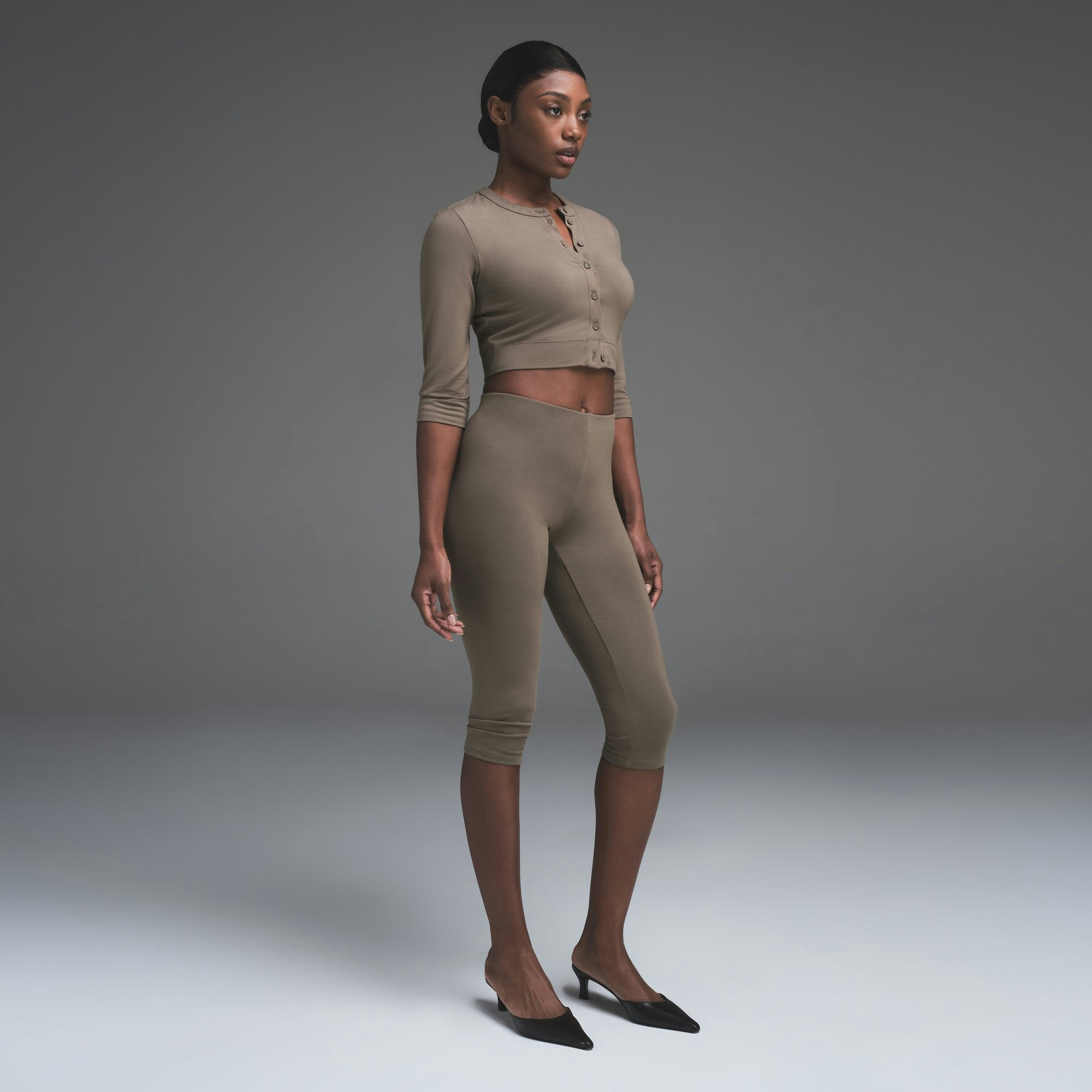 SMOOTH LOUNGE CROPPED CARDIGAN | TRUFFLE ON A MODEL BACK VIEW | FOCUS: 0.0, 1.0, 0.9