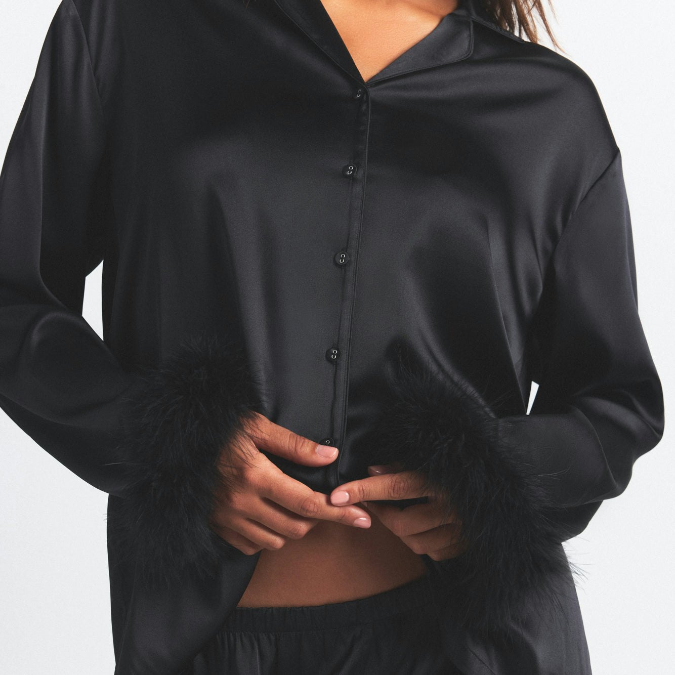 SILK FEATHER TRIM LONG SET | ONYX ON A MODEL SIDE VIEW @ | FOCUS: 0.0, 1.0, 0.9