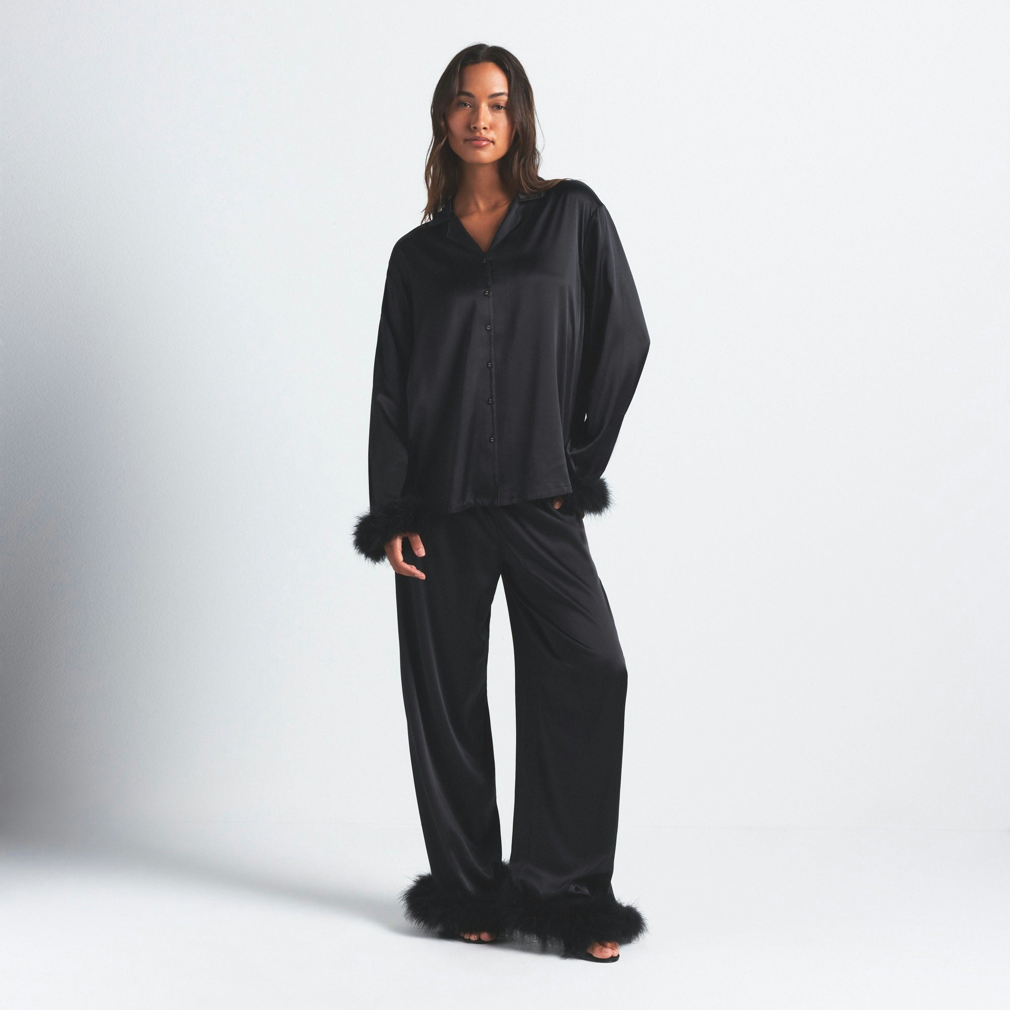 SILK FEATHER TRIM LONG SET | ONYX ON A MODEL FRONT VIEW @ | FOCUS: 0.0, 1.0, 0.9