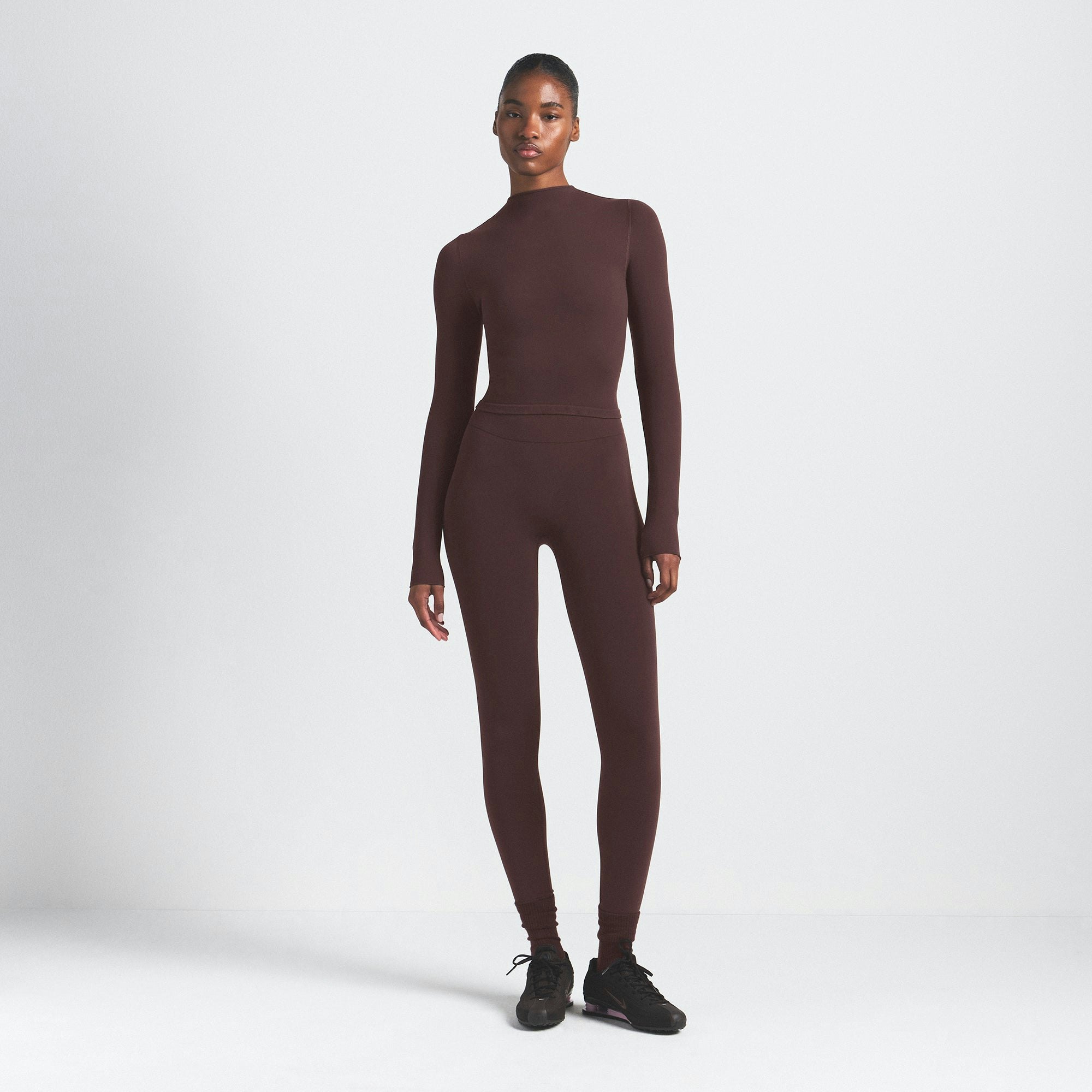 NikeSKIMS VINTAGE SEAMLESS MOCK NECK CROP TOP | PHOENIX ON A MODEL FRONT VIEW