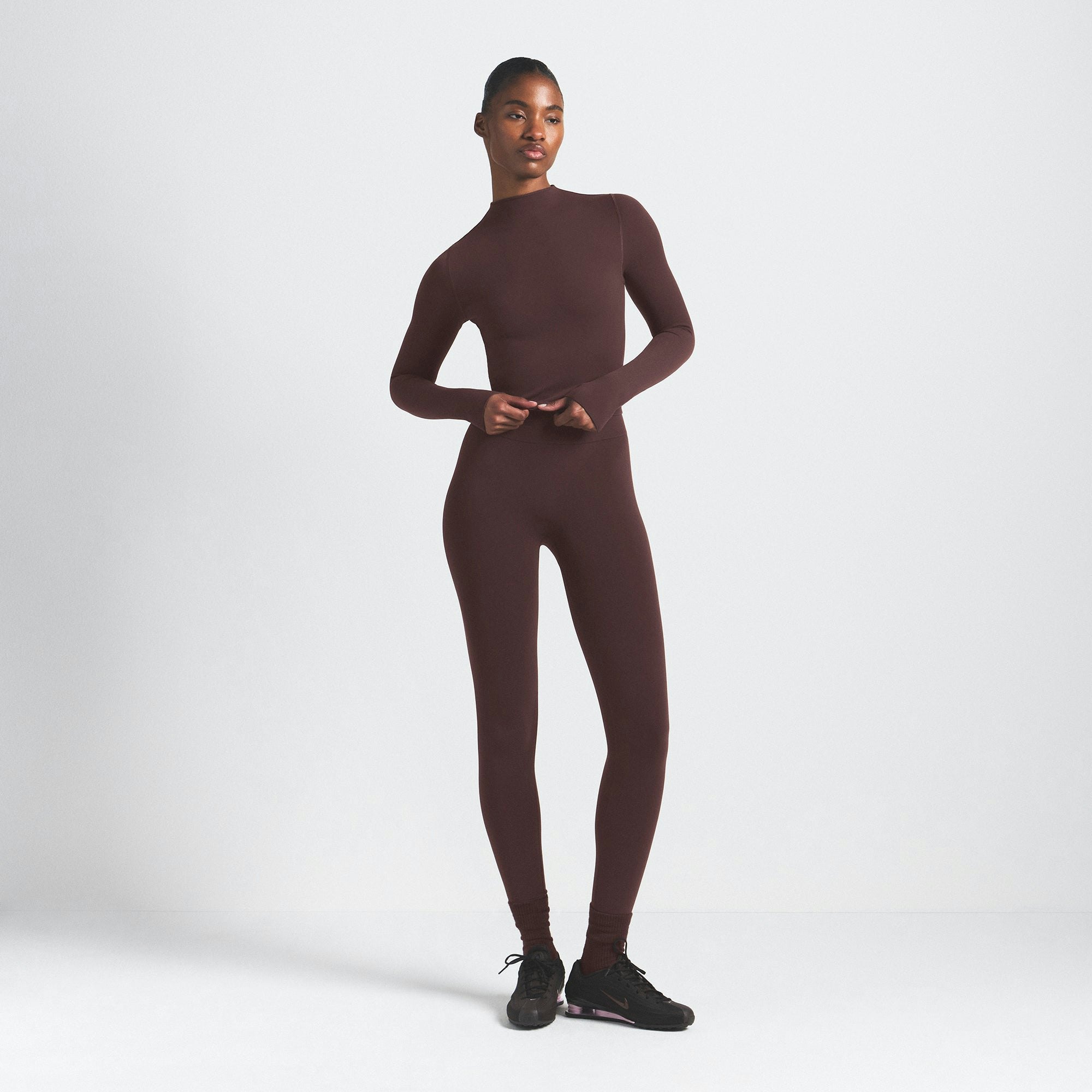 NikeSKIMS VINTAGE SEAMLESS MOCK NECK CROP TOP | PHOENIX ON A MODEL FRONT VIEW