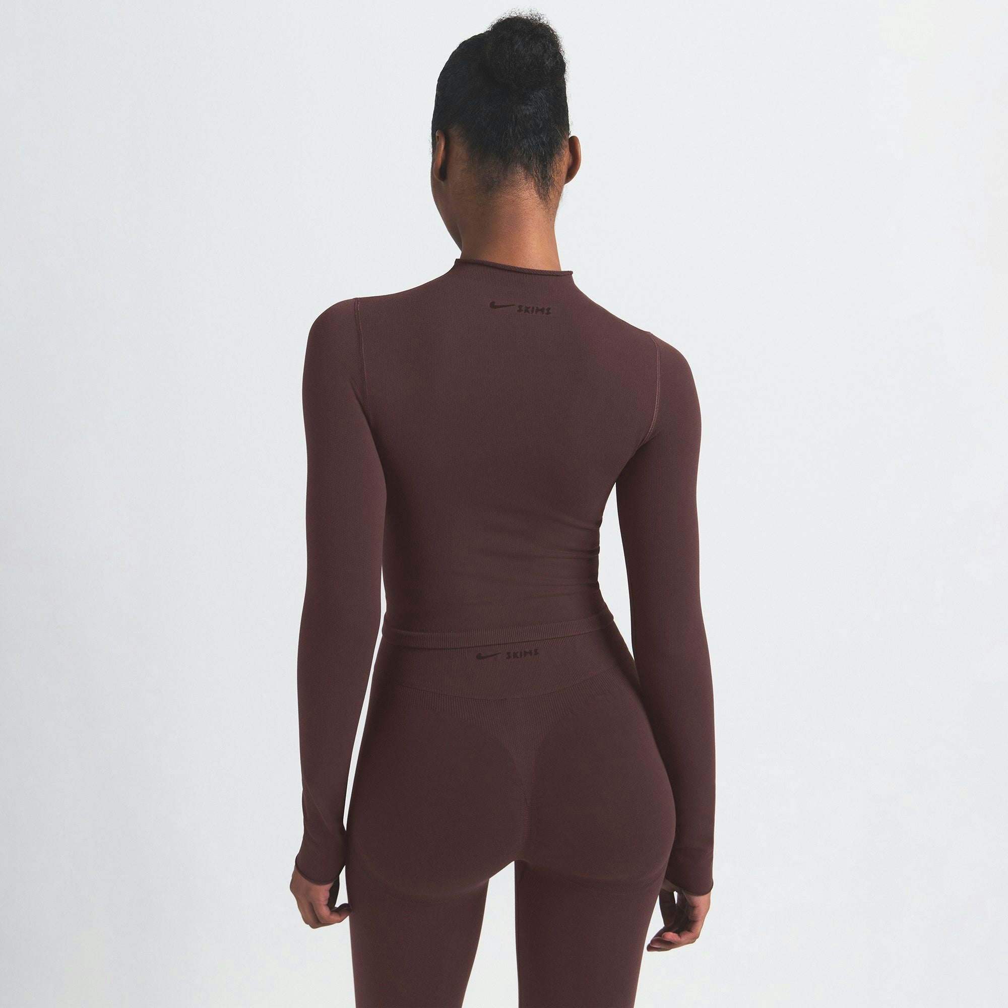 NikeSKIMS VINTAGE SEAMLESS MOCK NECK CROP TOP | PHOENIX ON A MODEL SIDE VIEW