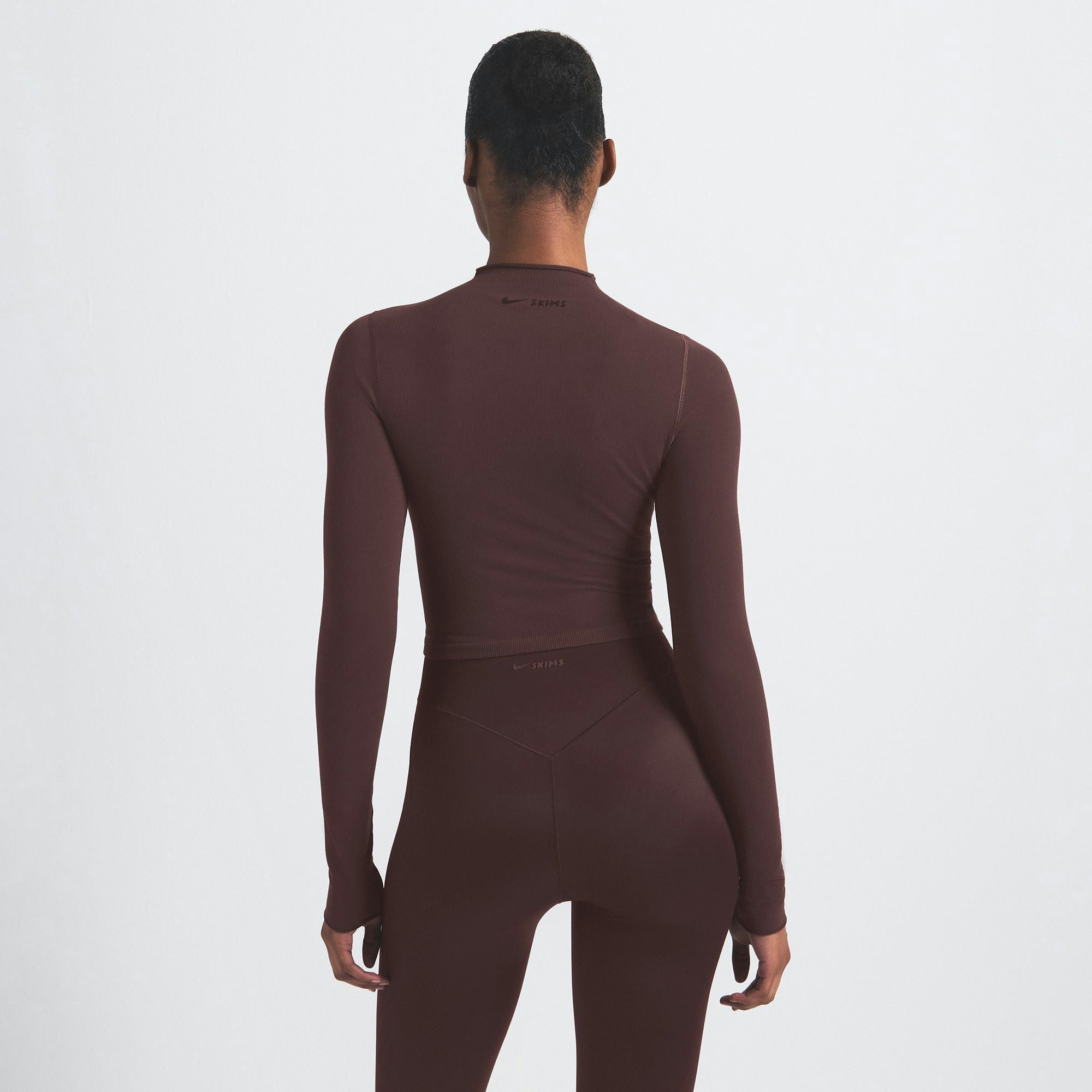 NikeSKIMS VINTAGE SEAMLESS MOCK NECK CROP TOP | PHOENIX ON A MODEL SIDE VIEW