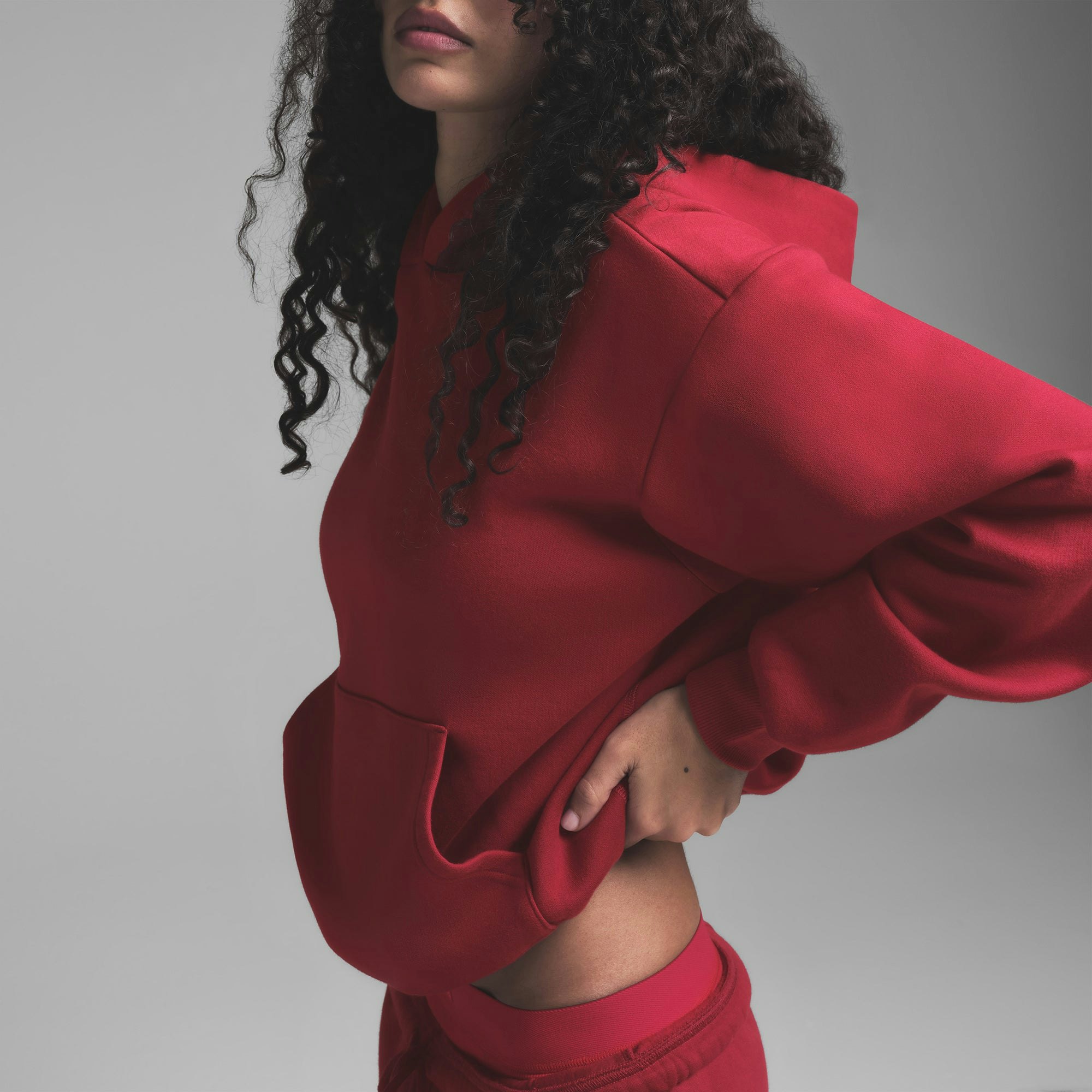 COTTON FLEECE CLASSIC HOODIE | BRICK ON A MODEL SIDE VIEW | FOCUS: 0.0, 1.0, 0.9