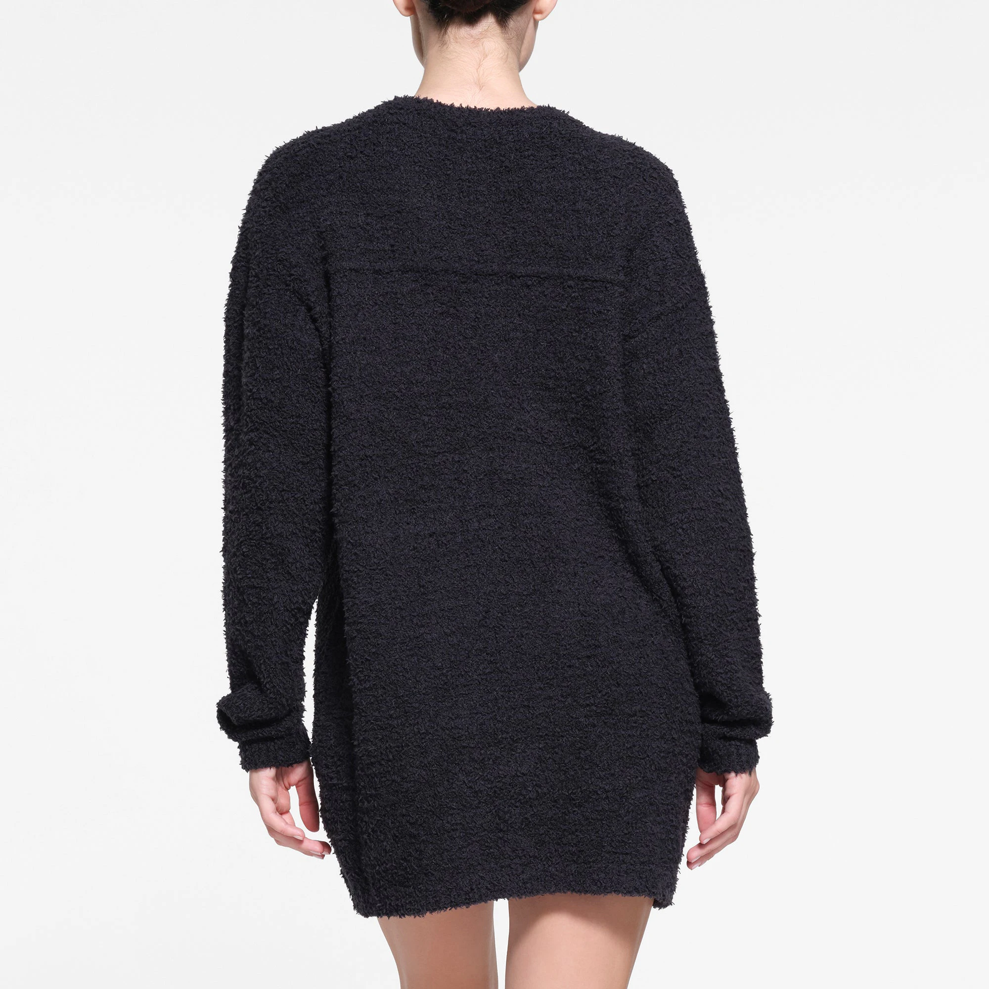 COZY KNIT V NECK MINI DRESS | ONYX ON A MODEL BACK VIEW
