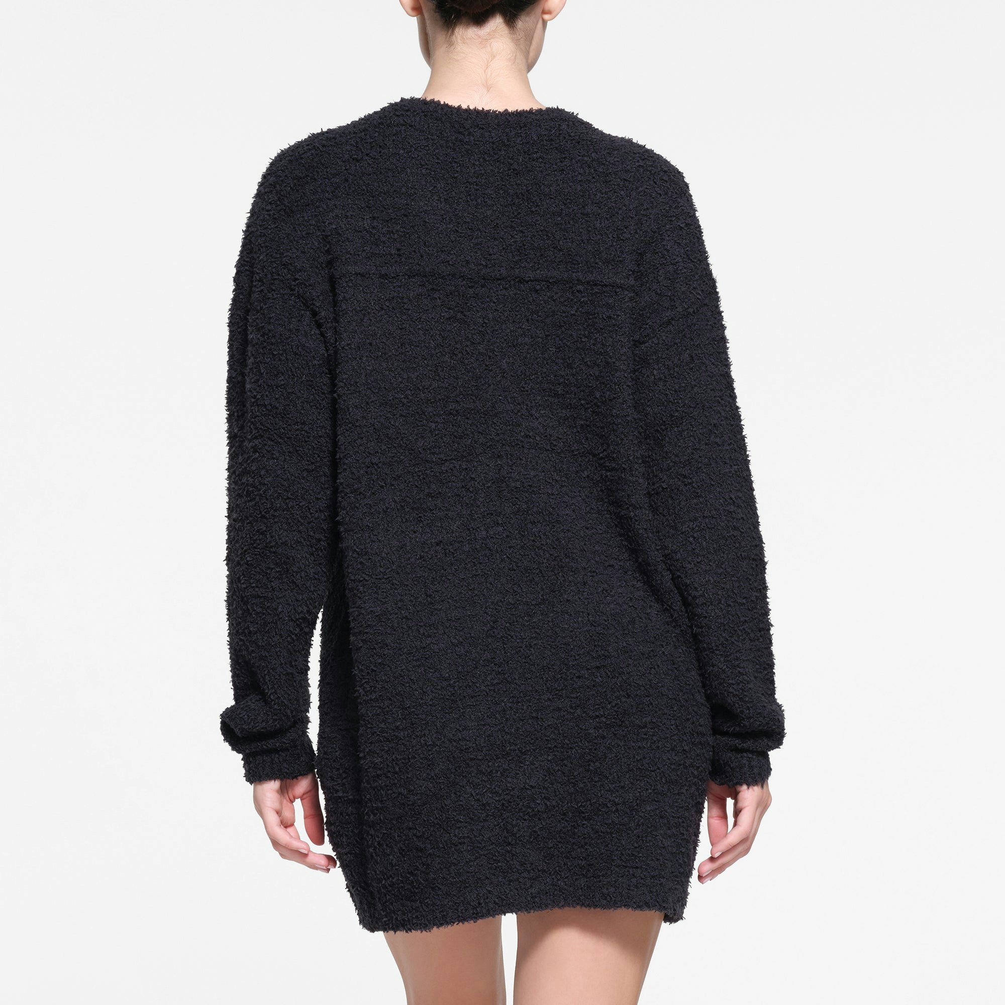 COZY KNIT V NECK MINI DRESS | ONYX ON A MODEL BACK VIEW
