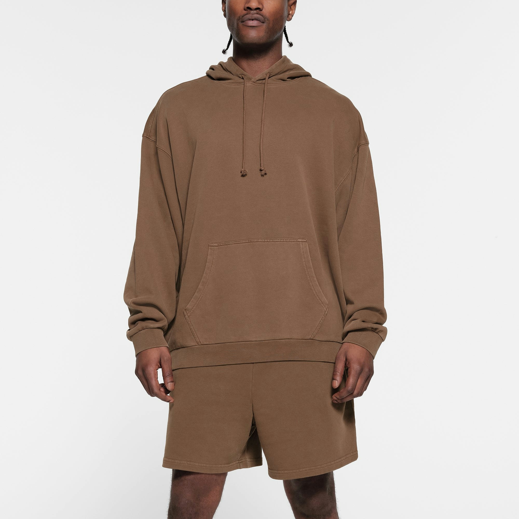 TERRY FLEECE MENS RELAXED HOODIE | OXIDE ON A MODEL FRONT VIEW