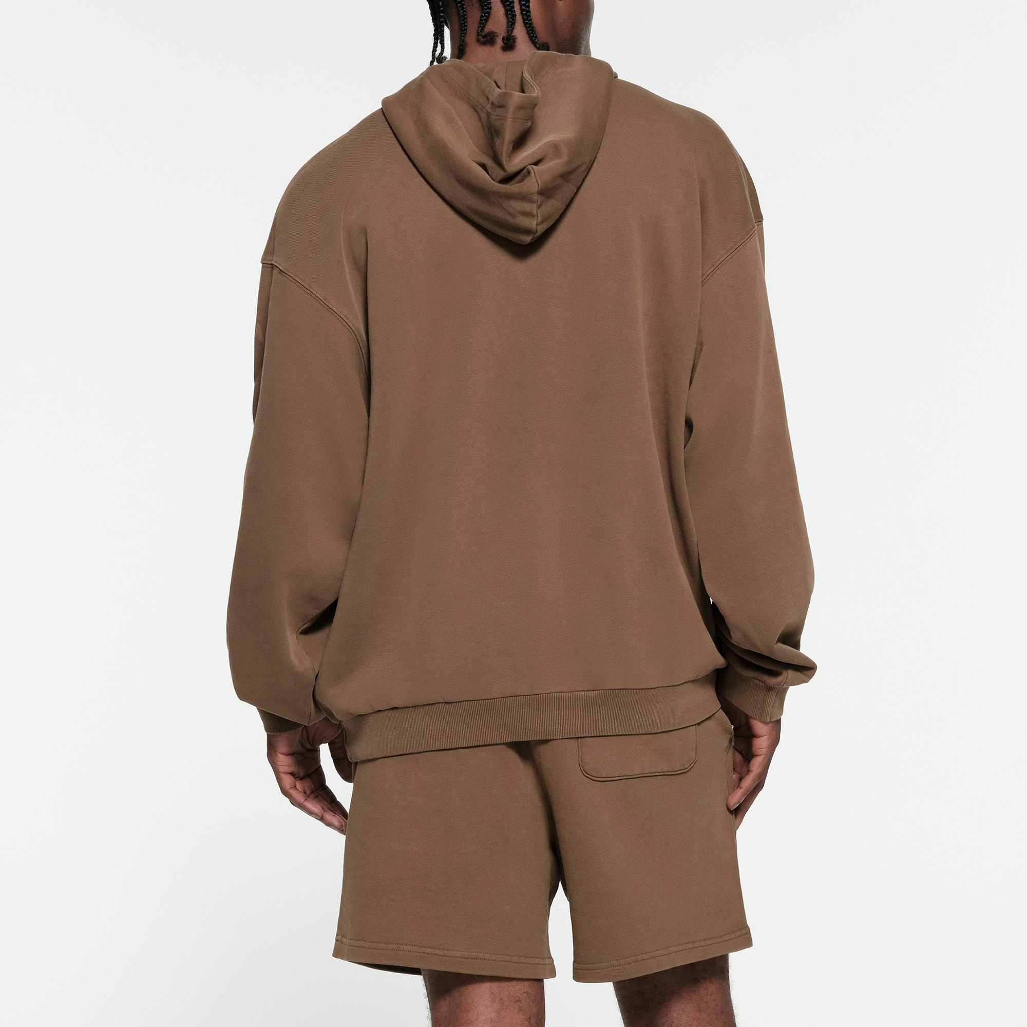TERRY FLEECE MENS RELAXED HOODIE | OXIDE ON A MODEL BACK VIEW