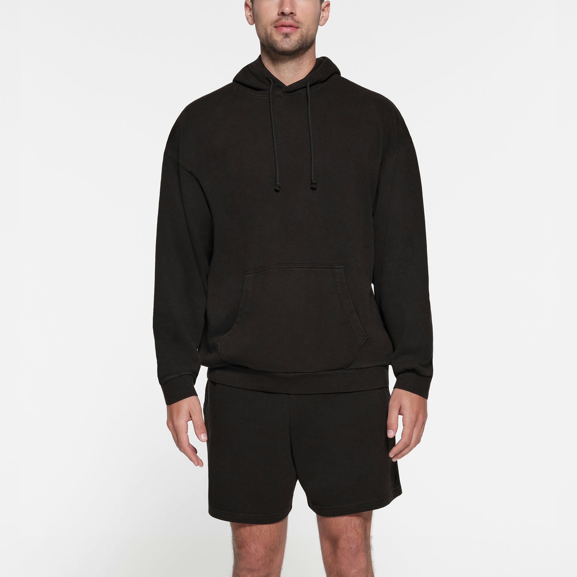 TERRY FLEECE MENS RELAXED HOODIE | WASHED OBSIDIAN ON A MODEL FRONT VIEW