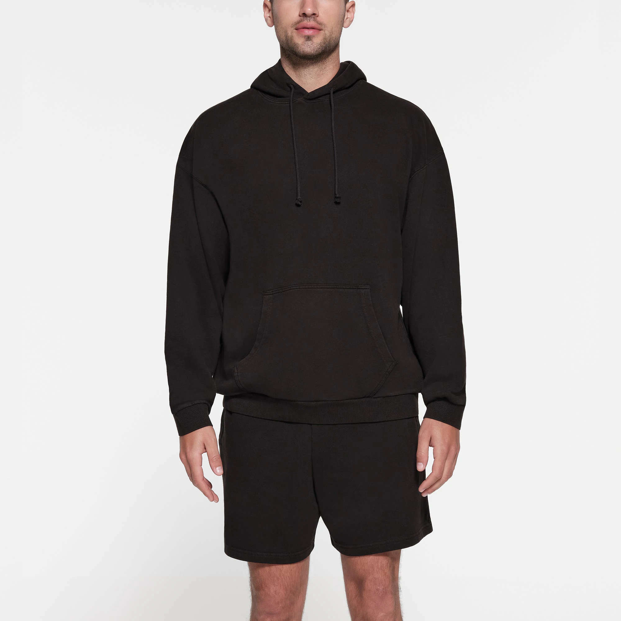 TERRY FLEECE MENS RELAXED HOODIE | WASHED OBSIDIAN ON A MODEL FRONT VIEW