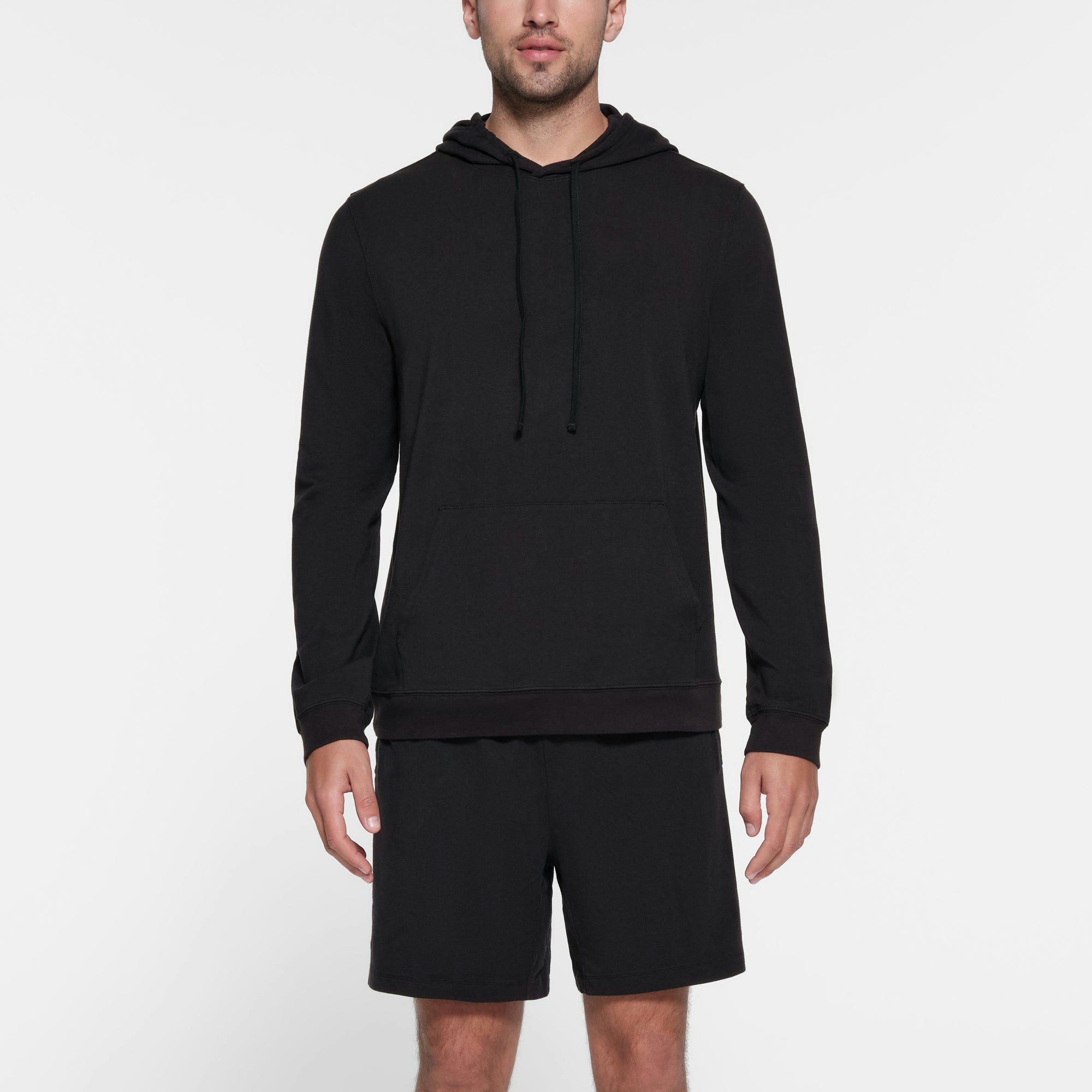 JERSEY LOUNGE MENS HOODIE | OBSIDIAN ON A MODEL FRONT VIEW