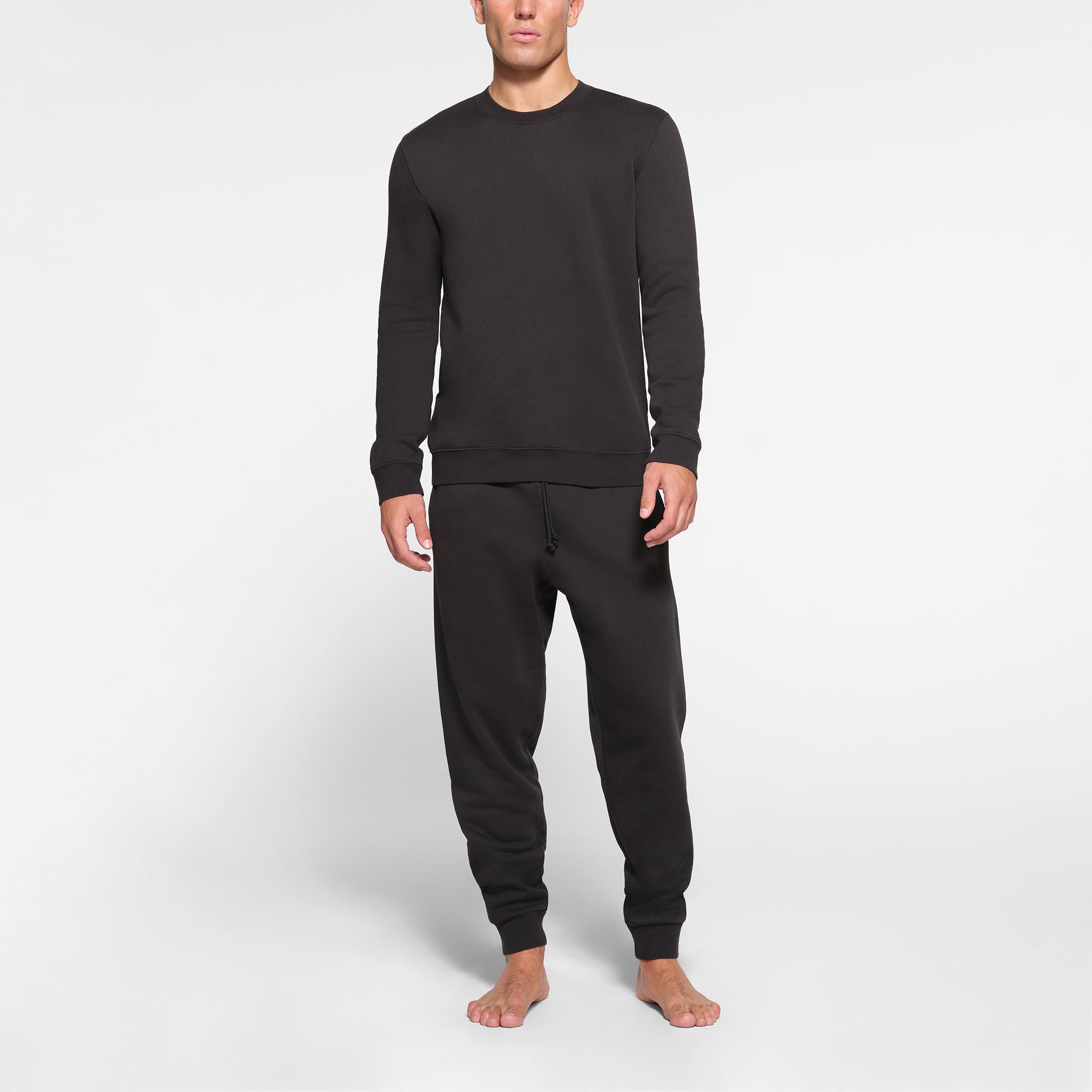 LOUNGE FLEECE MENS CREWNECK | WASHED ONYX ON A MODEL FRONT VIEW