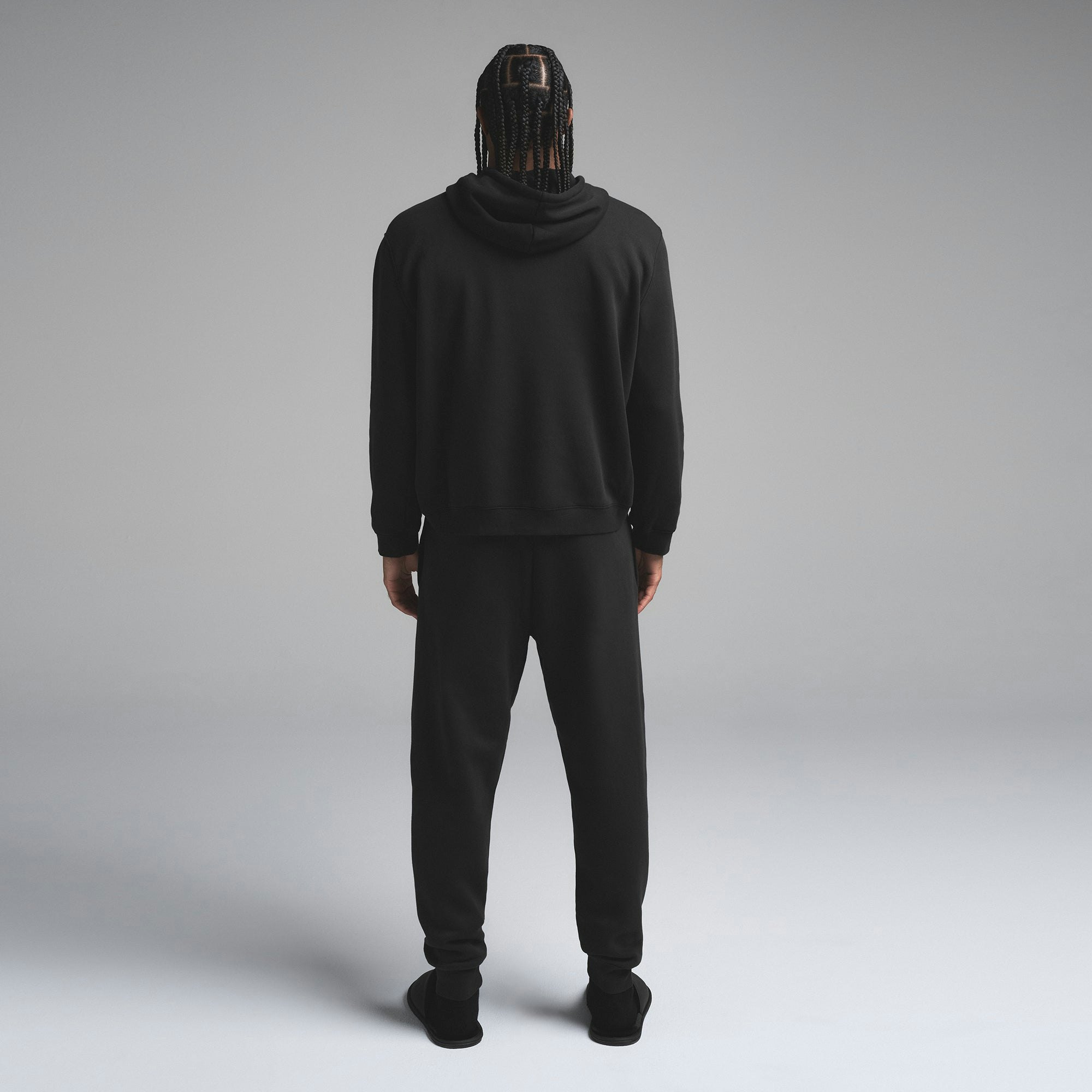 FLEECE LOUNGE MENS CLASSIC HOODIE | WASHED ONYX ON A MODEL SIDE VIEW | FOCUS: 0.0, 1.0, 0.9