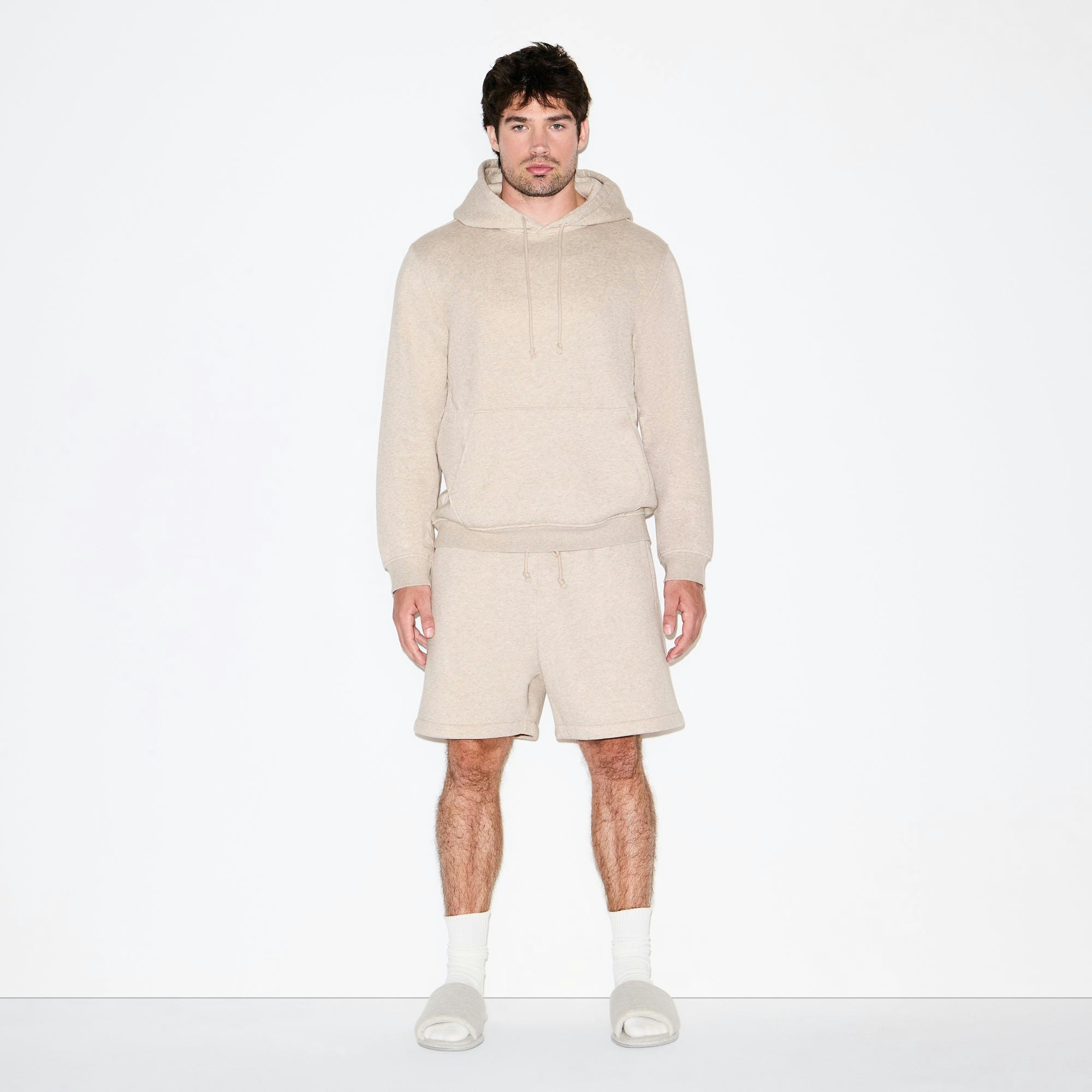 FLEECE LOUNGE MENS CLASSIC HOODIE | DESERT HEATHER ON A MODEL FRONT VIEW @ | FOCUS: 0.0, 1.0, 0.9