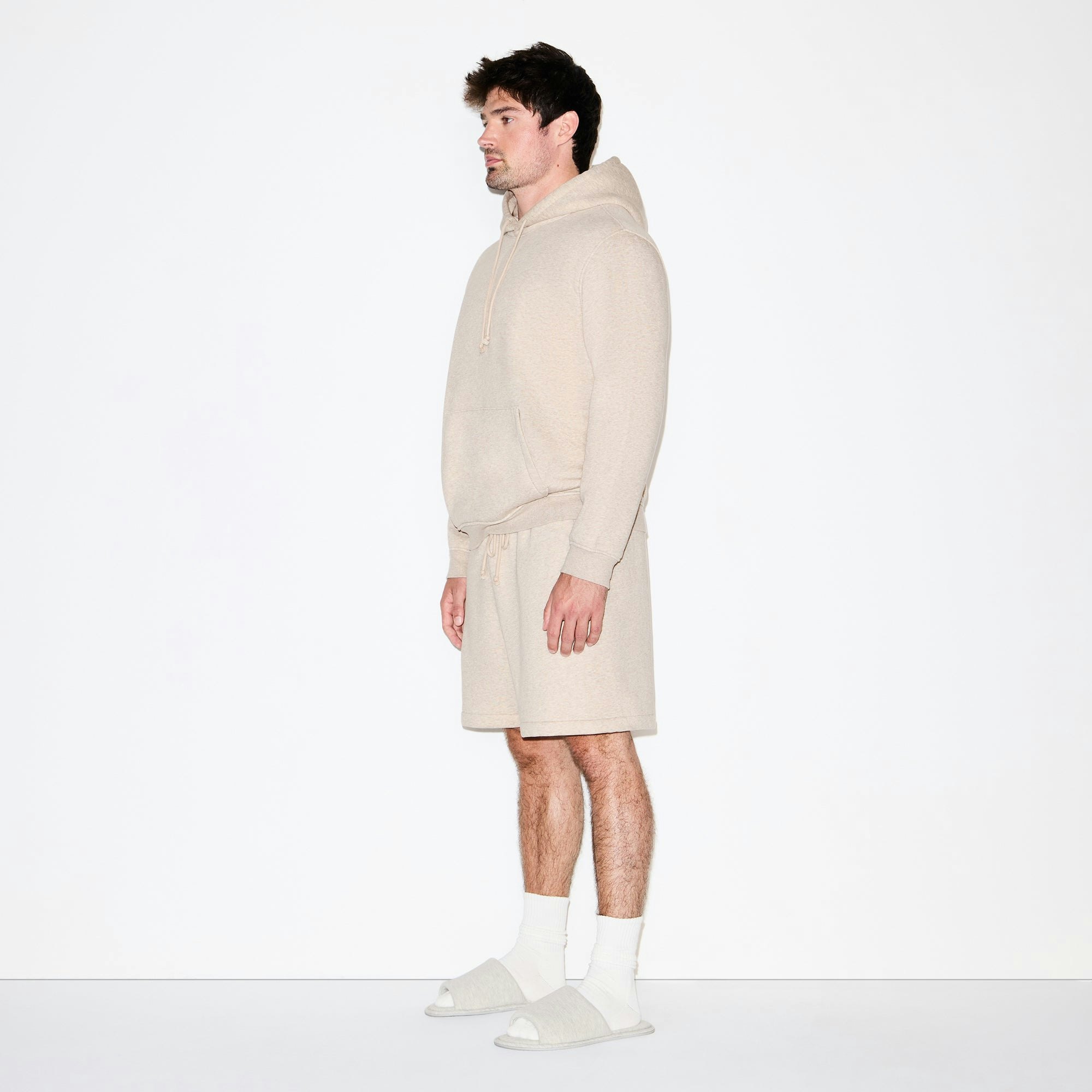 FLEECE LOUNGE MENS CLASSIC HOODIE | DESERT HEATHER ON A MODEL FRONT VIEW @ | FOCUS: 0.0, 1.0, 0.9