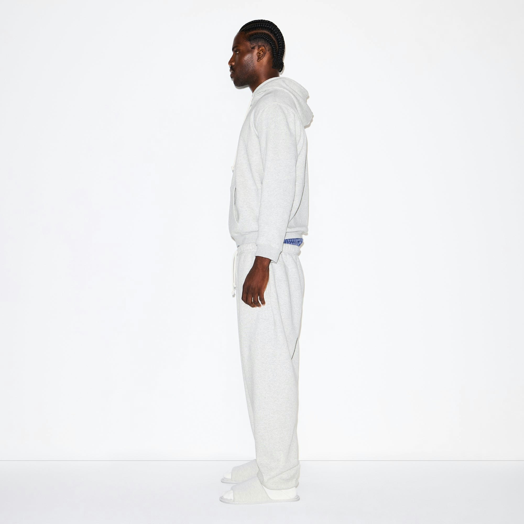 FLEECE LOUNGE MENS CLASSIC HOODIE | LIGHT HEATHER GREY ON A MODEL FRONT VIEW @ | FOCUS: 0.0, 1.0, 0.9