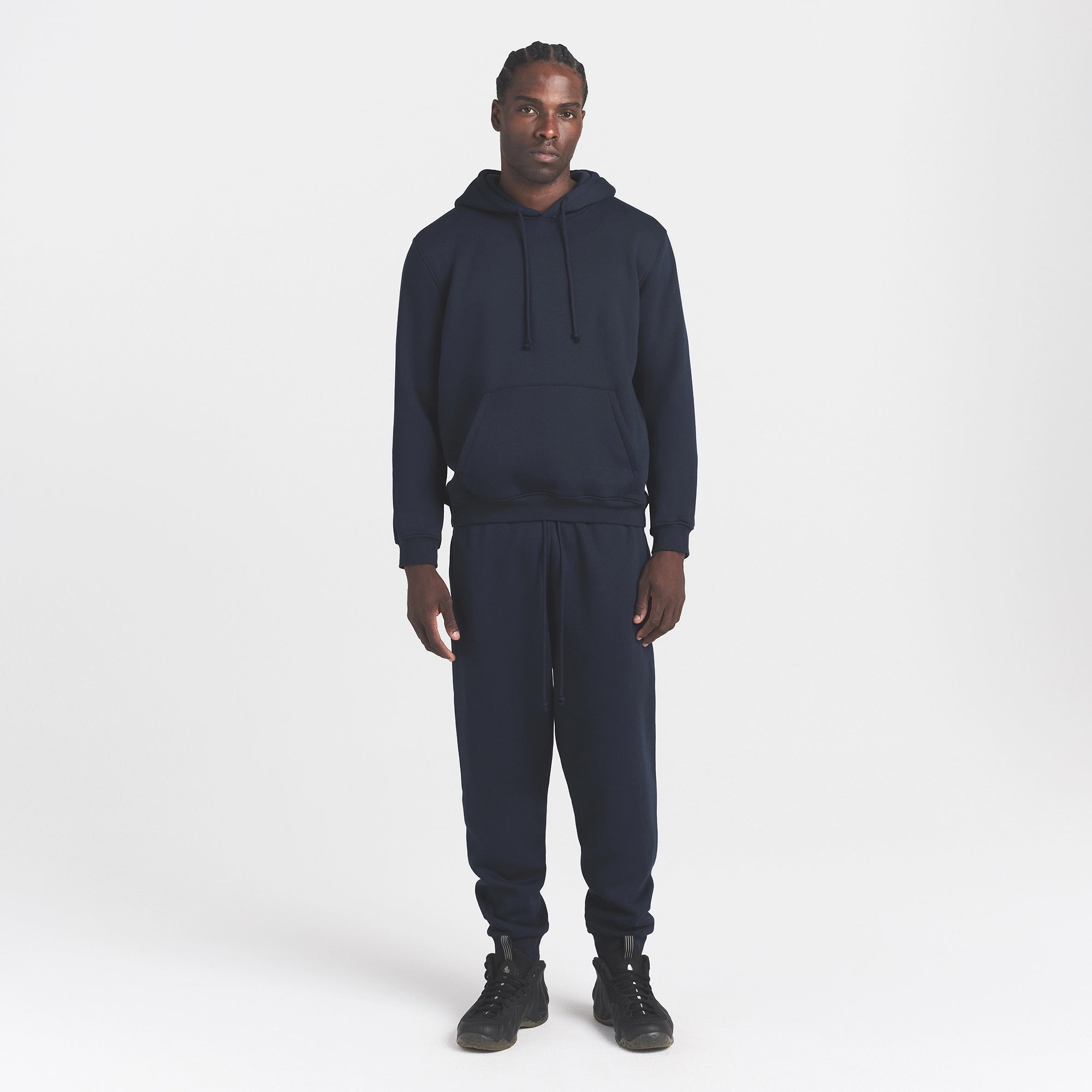 FLEECE LOUNGE MENS CLASSIC HOODIE | NAVY ON A MODEL FRONT VIEW @ | FOCUS: 0.0, 1.0, 0.9