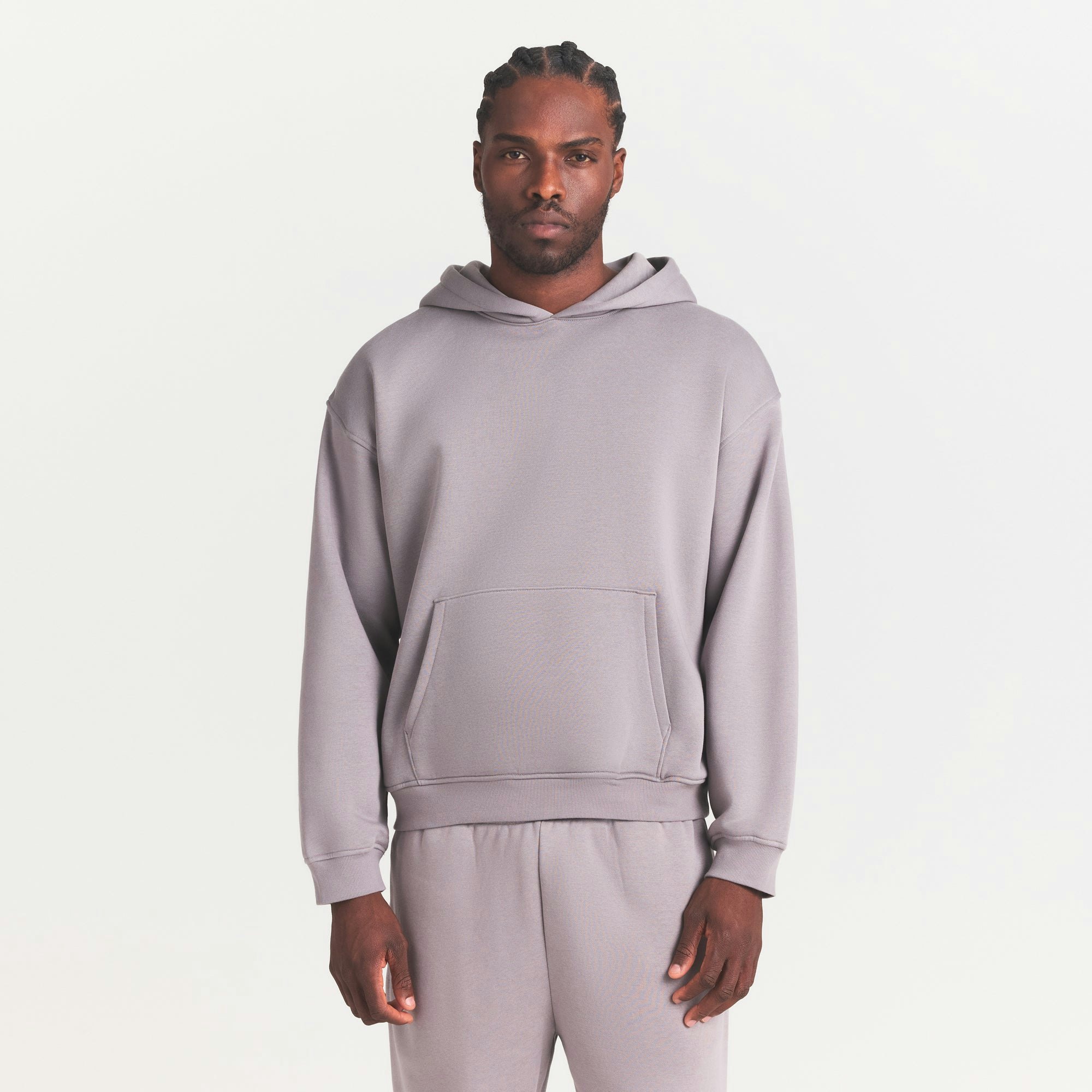 FLEECE LOUNGE MENS CLASSIC HOODIE | SHADOW ON A MODEL SIDE VIEW @ | FOCUS: 0.0, 1.0, 0.9