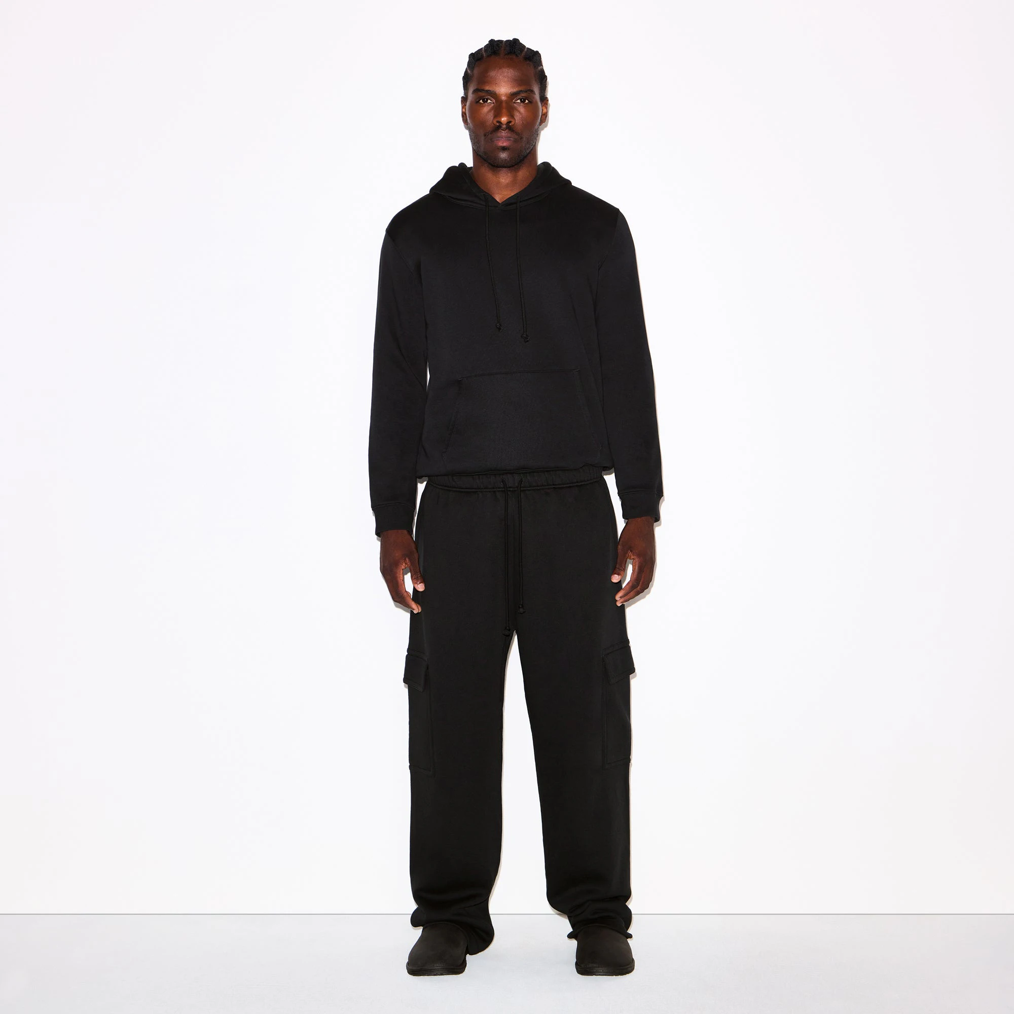 FLEECE LOUNGE MENS CLASSIC HOODIE | WASHED ONYX ON A MODEL FRONT VIEW @ | FOCUS: 0.0, 1.0, 0.9