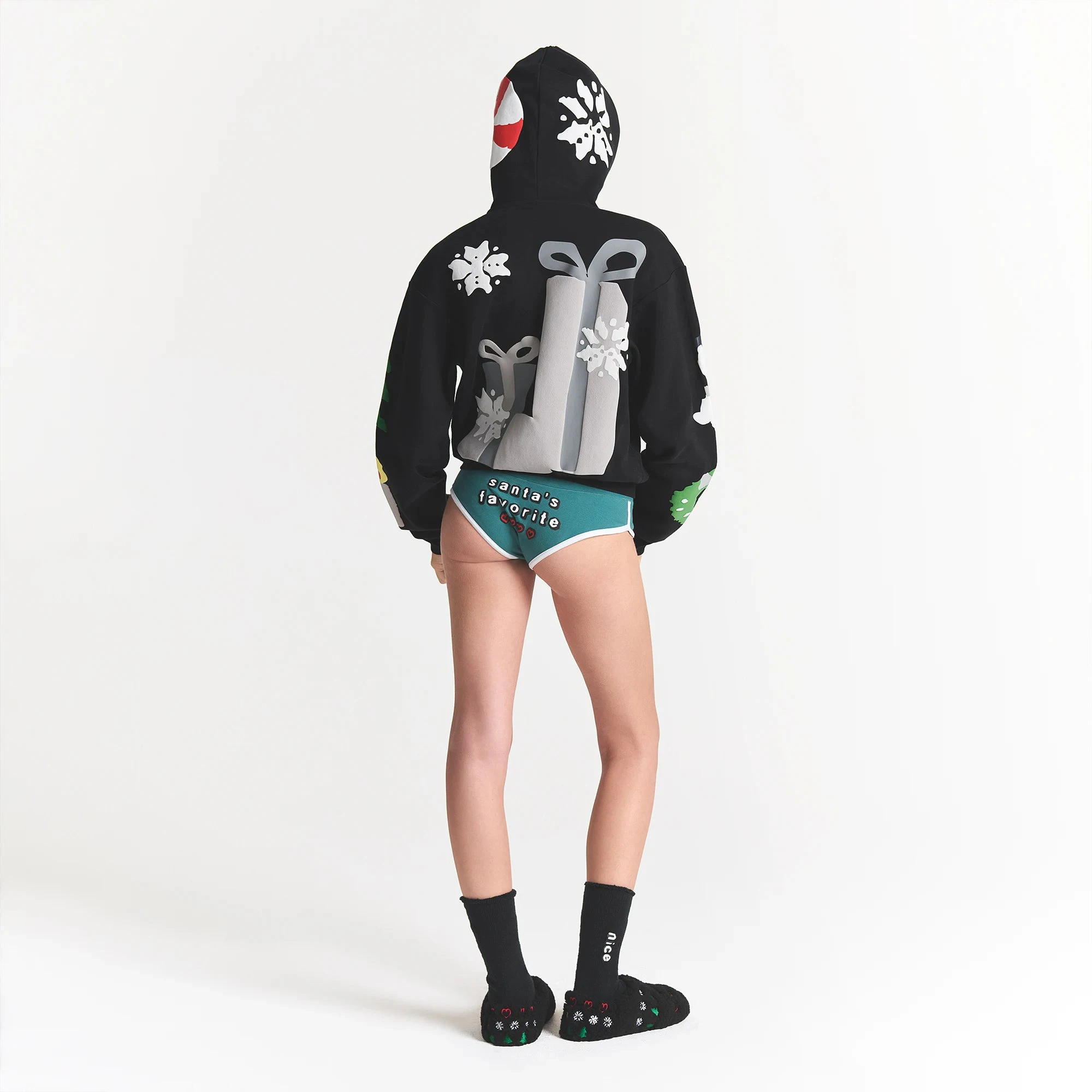 CACTUS PLANT FLEA MARKET X SKIMS COTTON FLEECE HOODIE | ONYX GINGERBREAD PRINT ON A MODEL BACK VIEW @ | FOCUS: 0.0, 1.0, 0.9