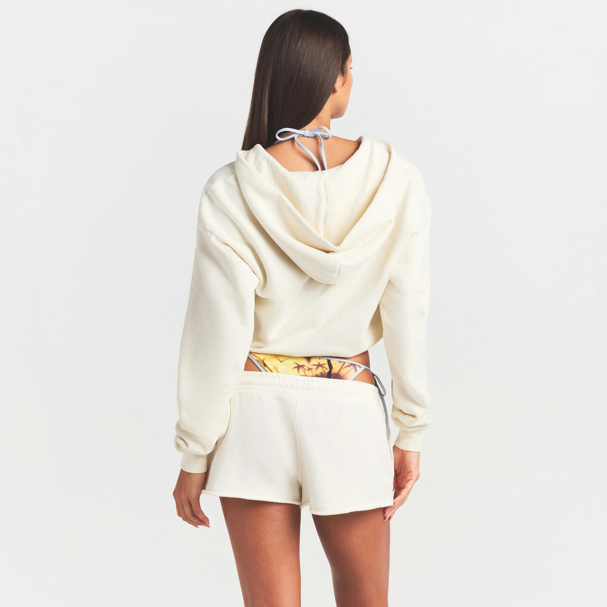 FRENCH TERRY ZIP UP HOODIE | ECRU ON A MODEL SIDE VIEW @ | FOCUS: 0.0, 1.0, 0.9