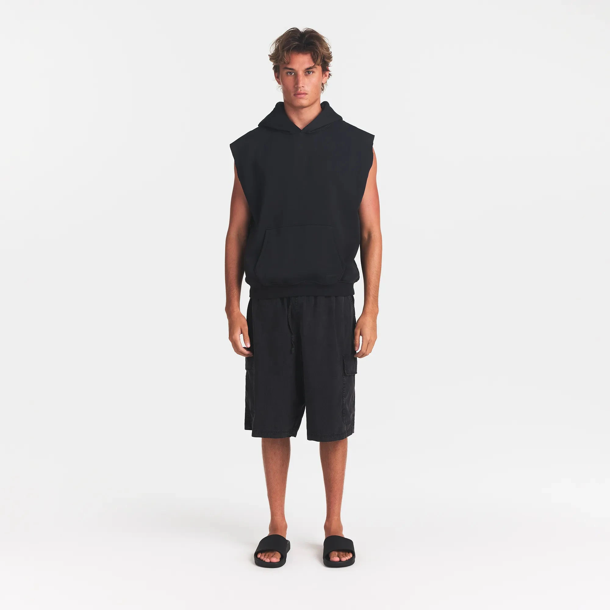 FLEECE LOUNGE MENS SLEEVELESS HOODIE | WASHED ONYX | MODEL FRONT VIEW @ | FOCUS: 0.0, 1.0, 0.9