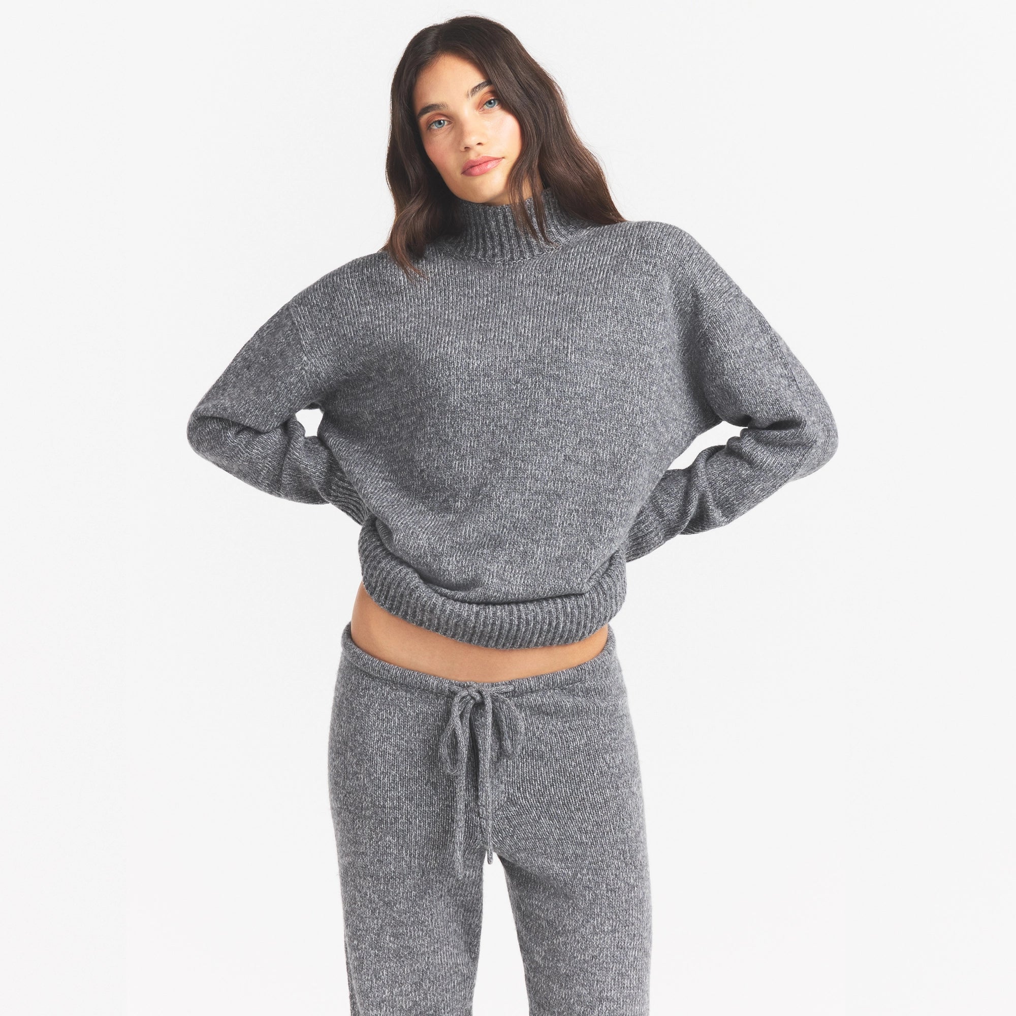 TWEED KNIT OVERSIZED TURTLENECK | DARK HEATHER GREY ON A MODEL SIDE VIEW @ | FOCUS: 0.0, 1.0, 0.9
