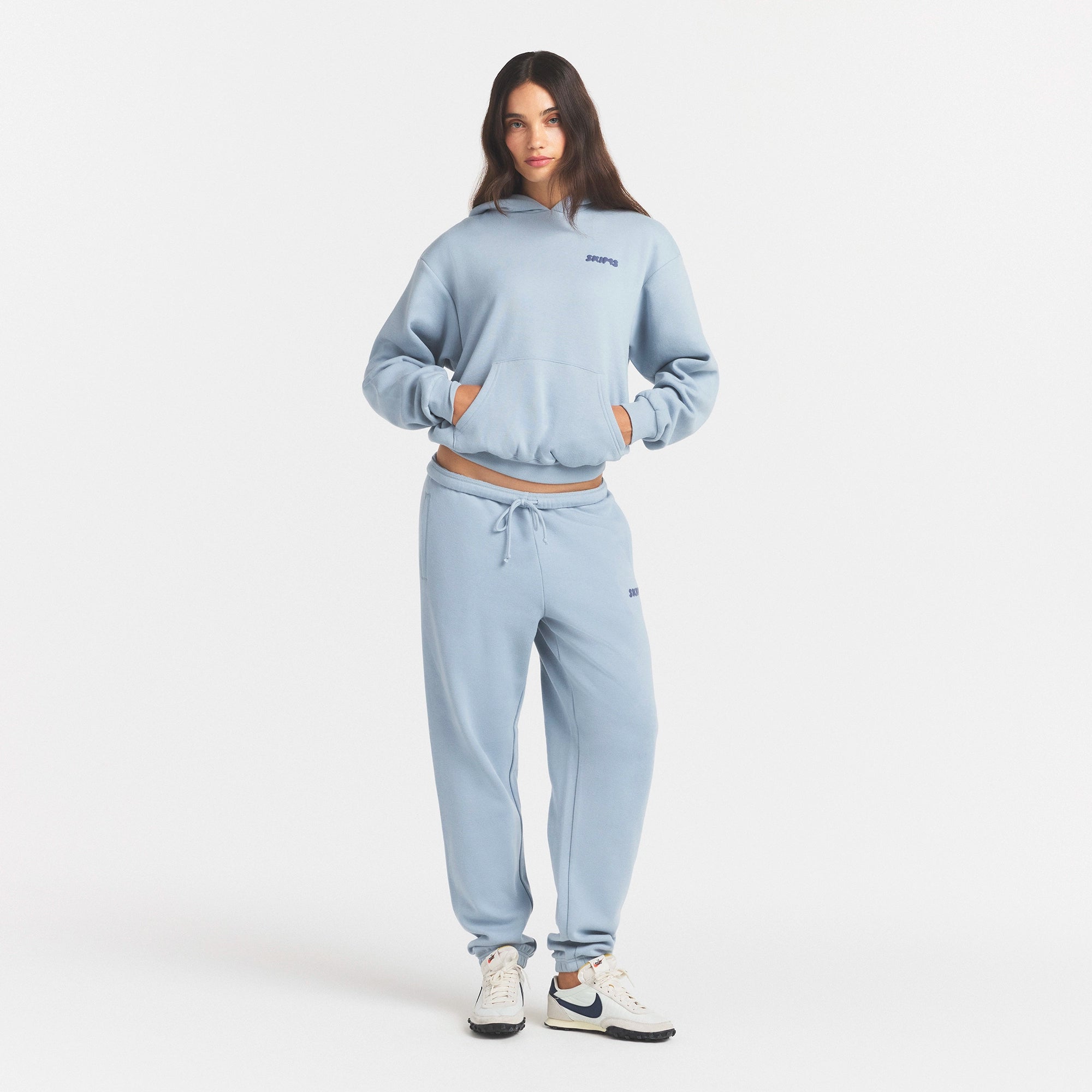 COTTON FLEECE HOODIE WITH EMBOSSED LOGO | FOG & LAYS FLAT ON A WHITE BACKGROUND | FLT @ | FOCUS: 0.0, 1.0, 0.9