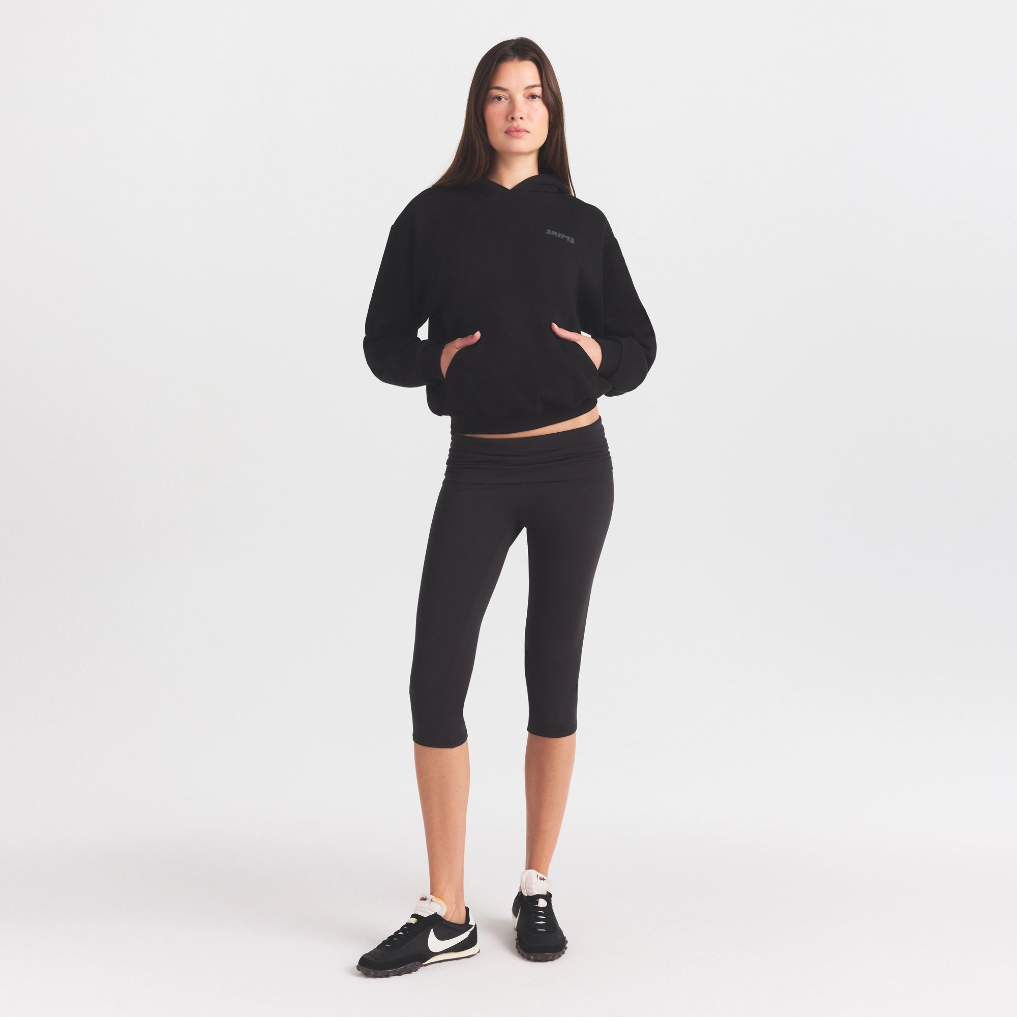 COTTON FLEECE HOODIE WITH EMBOSSED LOGO | ONYX ON A MODEL FRONT VIEW @ | FOCUS: 0.0, 1.0, 0.9
