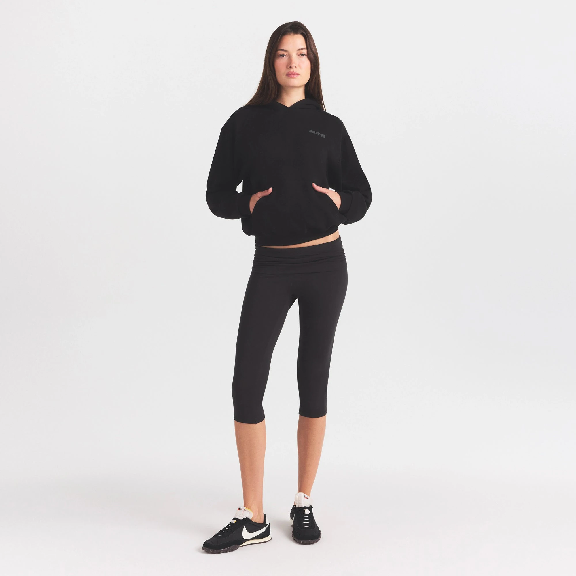 COTTON FLEECE HOODIE WITH EMBOSSED LOGO | ONYX ON A MODEL FRONT VIEW @ | FOCUS: 0.0, 1.0, 0.9
