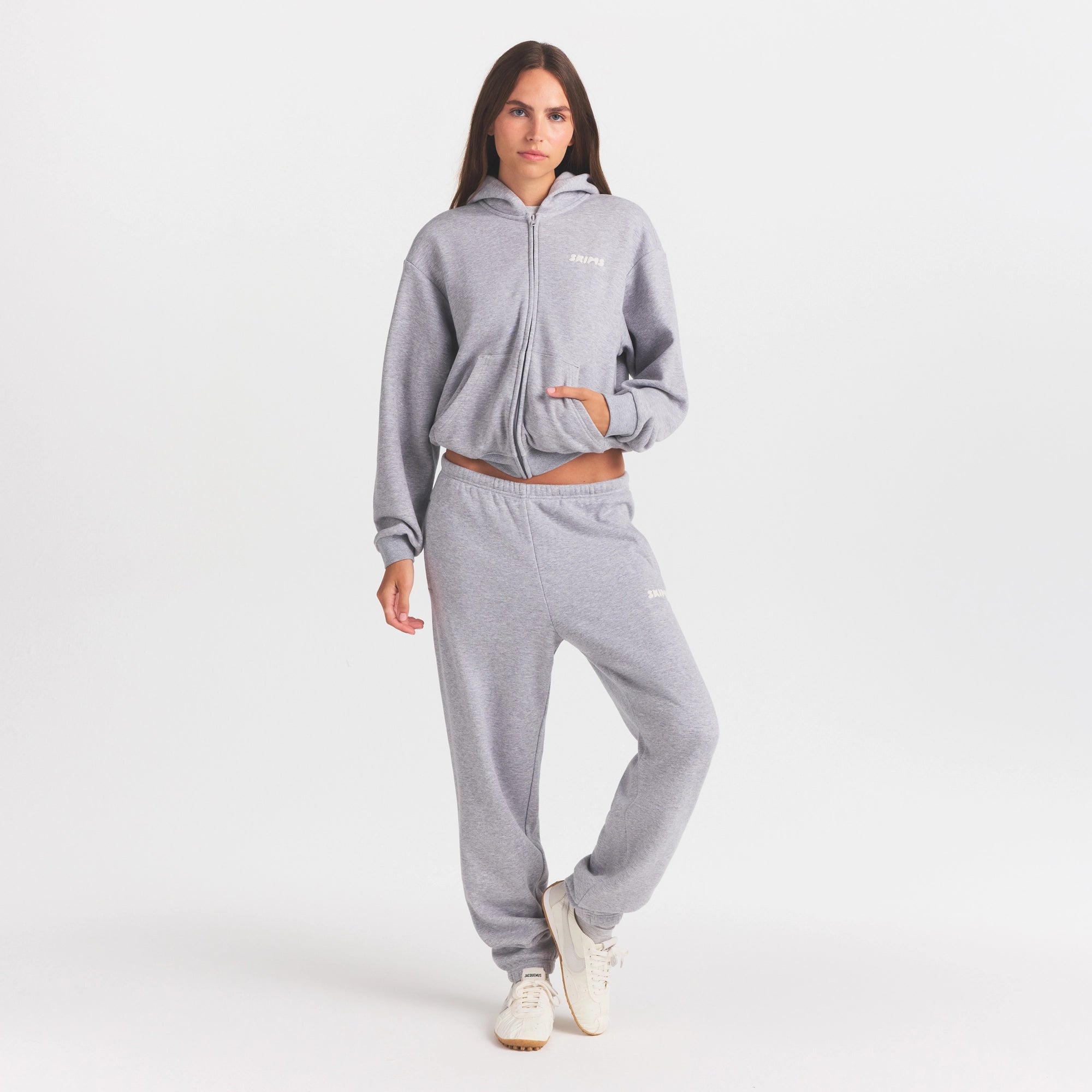COTTON FLEECE STRAIGHT LEG PANT WITH EMBOSSED LOGO | HEATHER GREY & LAYS FLAT ON A WHITE BACKGROUND | FLT