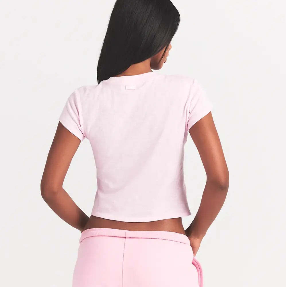 WORN IN JERSEY BABY HEART T-SHIRT | BABY PINK ON A MODEL BACK VIEW @ | FOCUS: 0.0, 1.0, 0.9