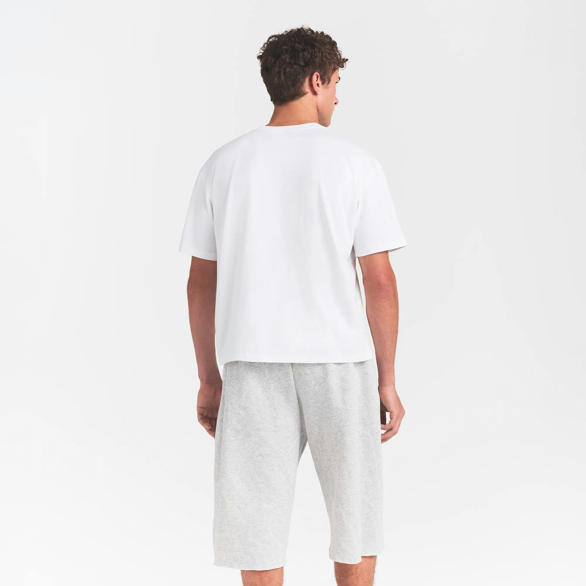 HEAVYWEIGHT COTTON MENS RELAXED CROPPED CREW NECK T-SHIRT | CHALK ON A MODEL BACK VIEW @ | FOCUS: 0.0, 1.0, 0.9