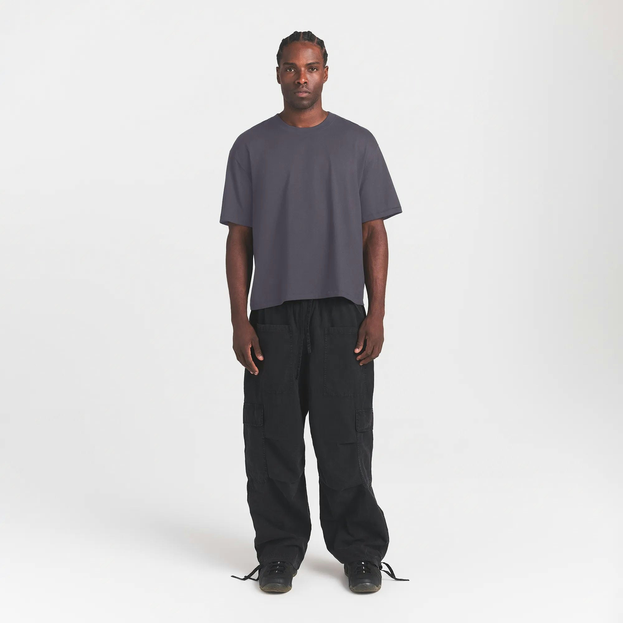 HEAVYWEIGHT COTTON MENS RELAXED CROPPED CREW NECK T-SHIRT | RAVEN ON A MODEL FRONT VIEW @ | FOCUS: 0.0, 1.0, 0.9