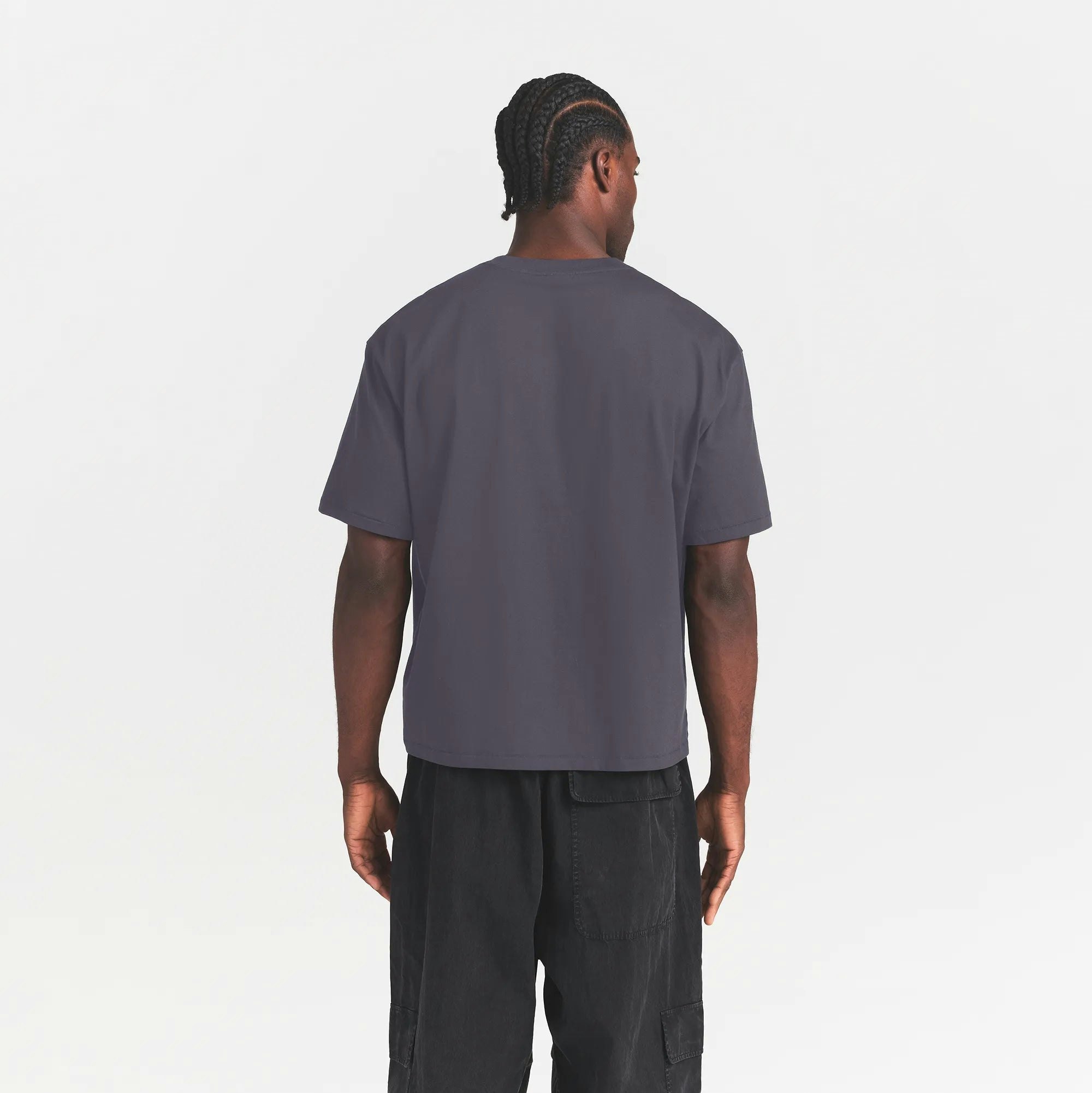 HEAVYWEIGHT COTTON MENS RELAXED CROPPED CREW NECK T-SHIRT | RAVEN ON A MODEL BACK VIEW @ | FOCUS: 0.0, 1.0, 0.9