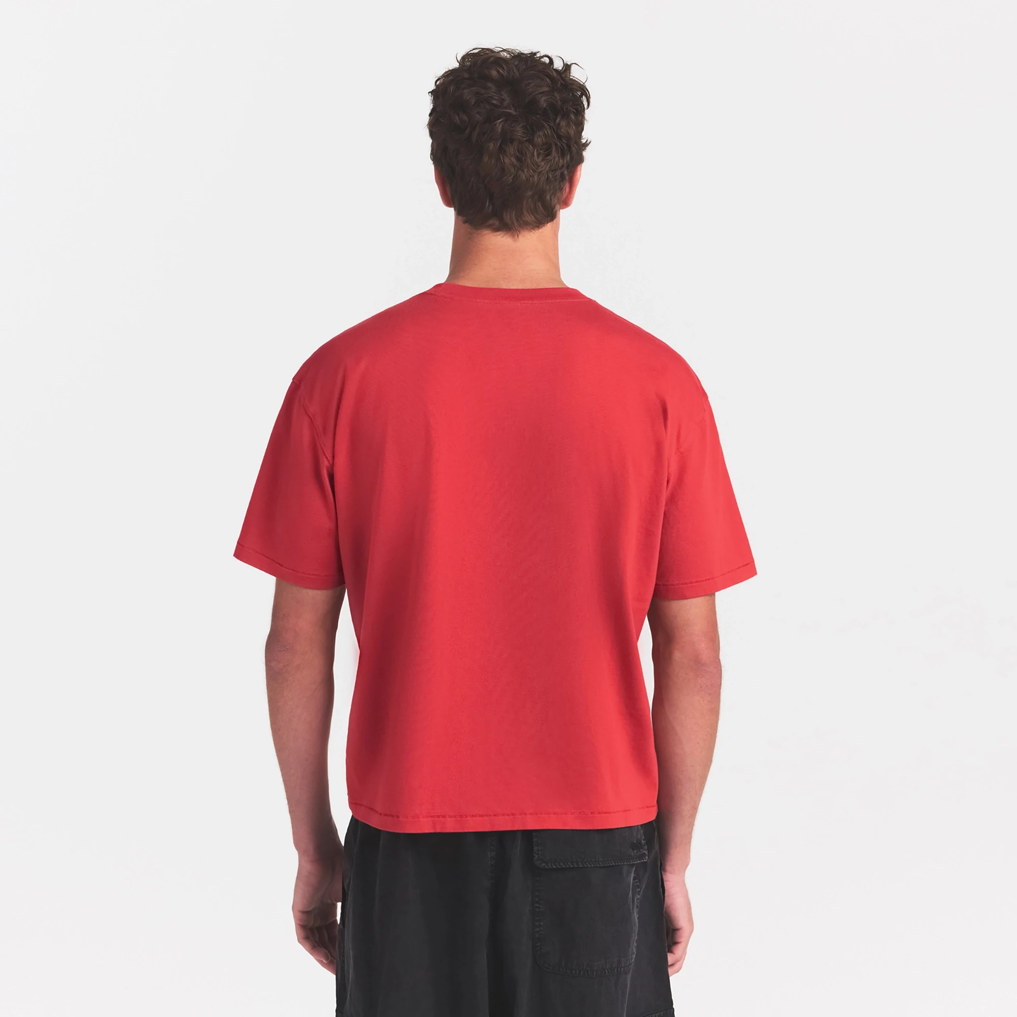 HEAVYWEIGHT COTTON MENS RELAXED CROPPED CREWNECK | WASHED RED ON A MODEL SIDE VIEW @ | FOCUS: 0.0, 1.0, 0.9