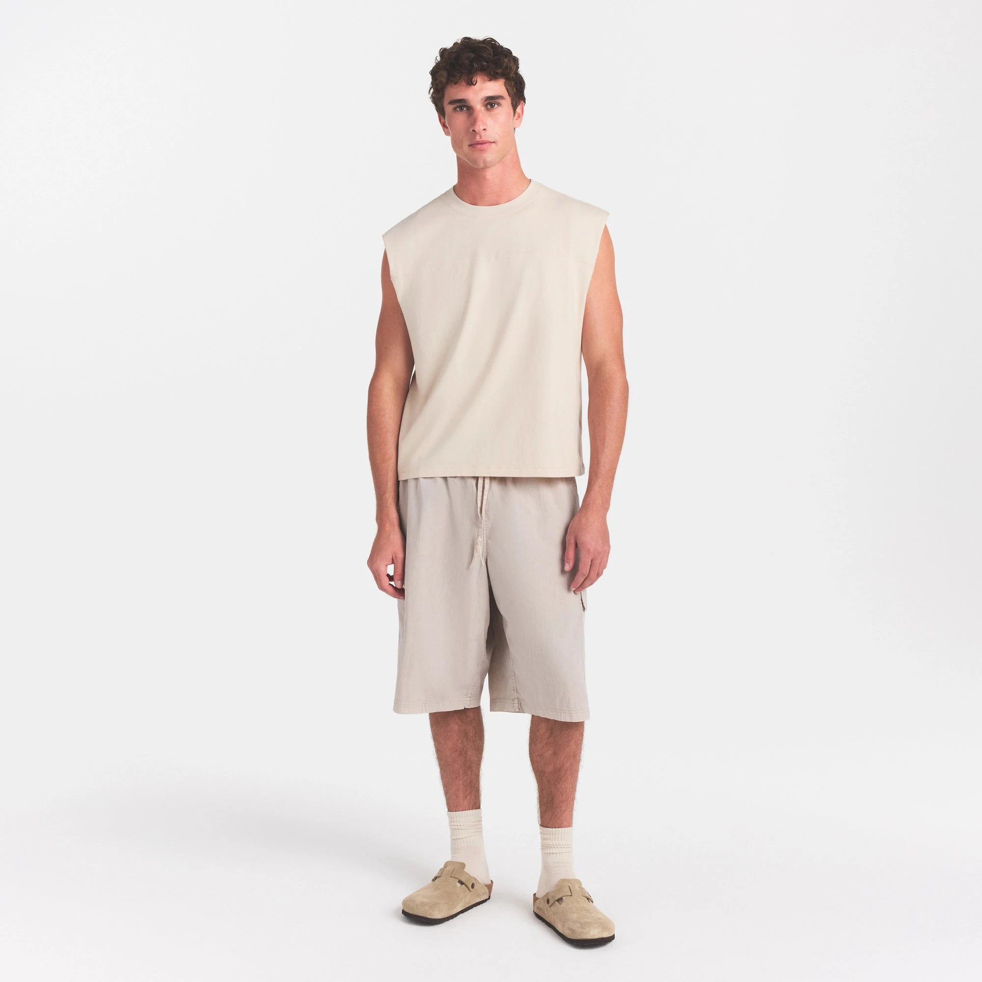 HEAVYWEIGHT COTTON MENS CROPPED MUSCLE TANK | BUFF ON A MODEL FRONT VIEW @ | FOCUS: 0.0, 1.0, 0.9
