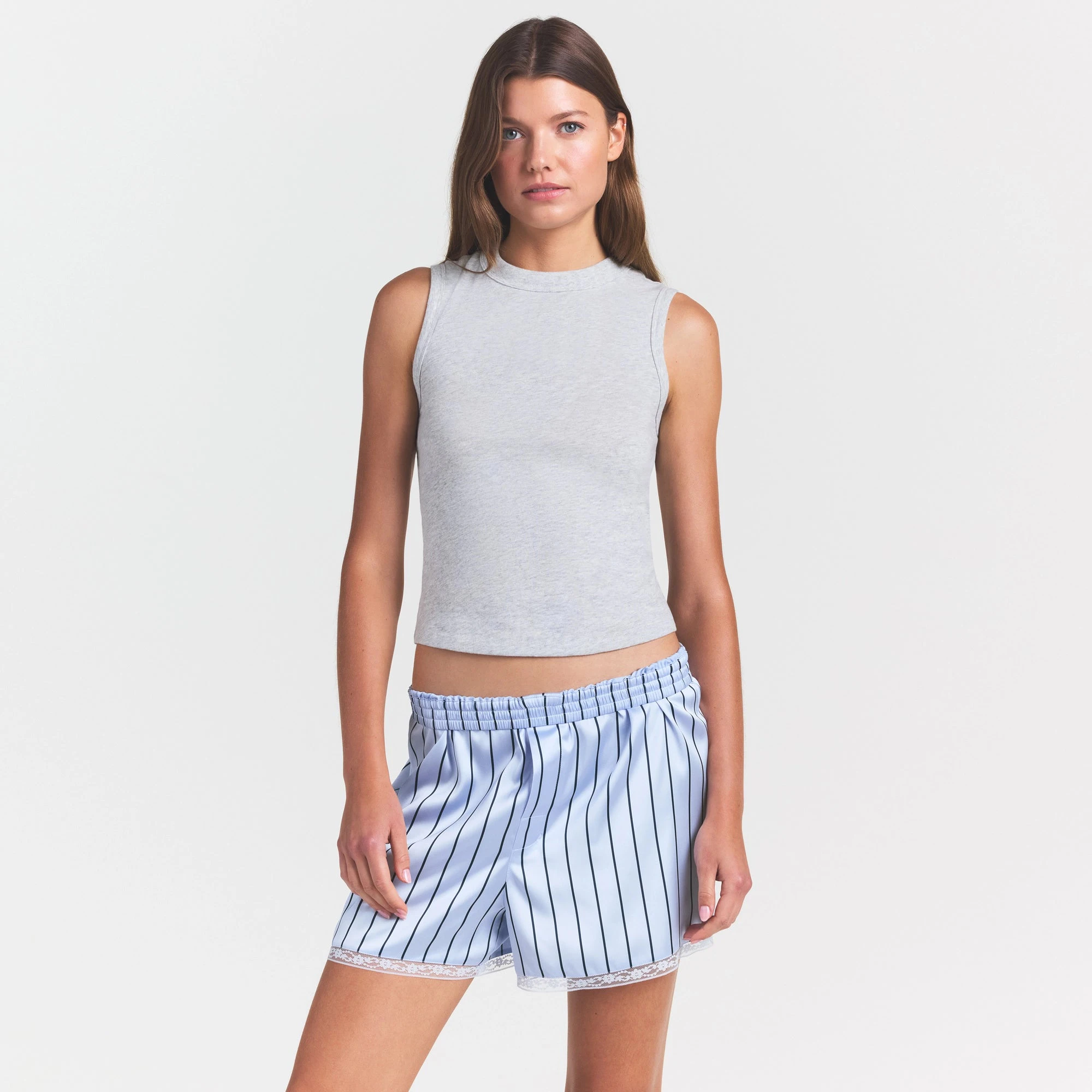 WORN IN JERSEY HIGH CREW TANK | LIGHT HEATHER GREY ON A MODEL SIDE VIEW @ | FOCUS: 0.0, 1.0, 0.9